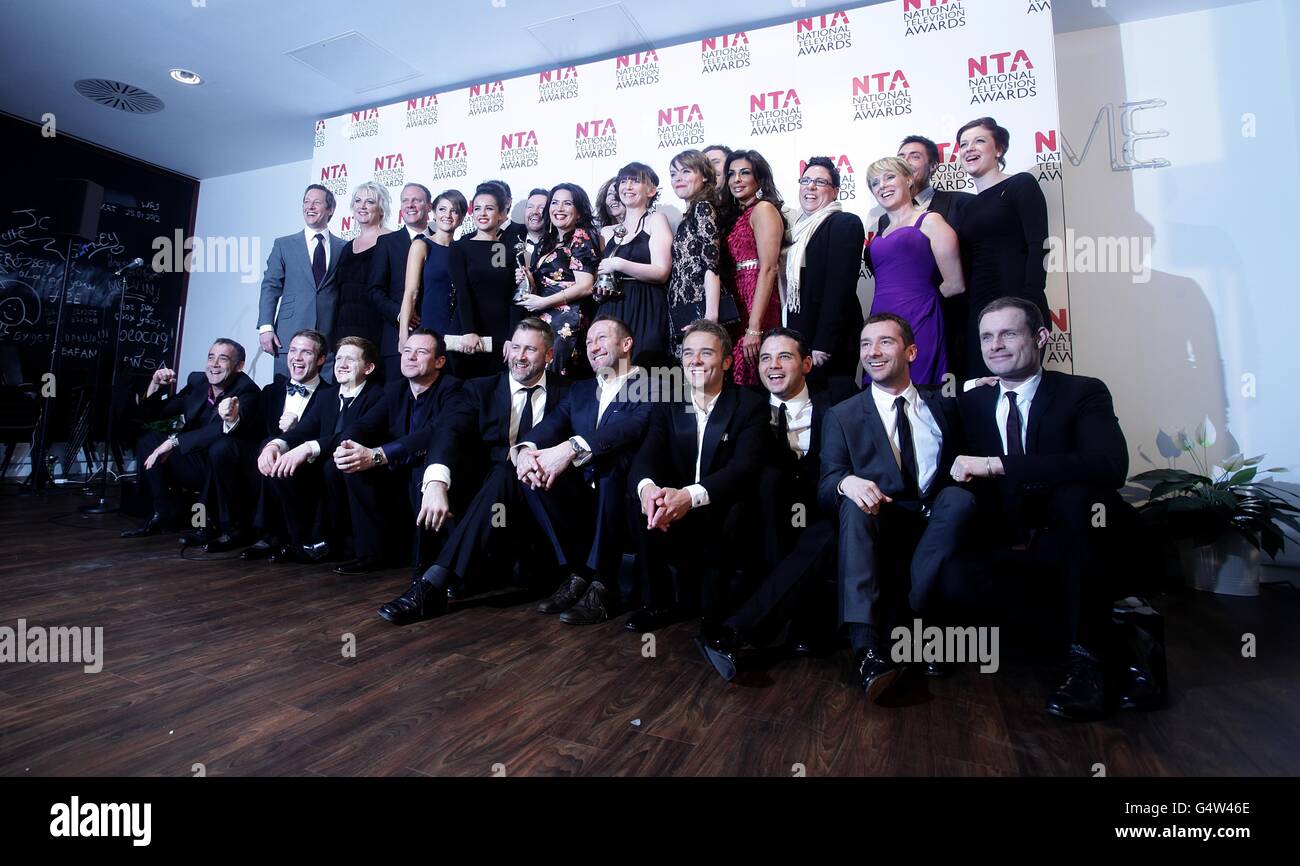 Cast and crew of Coronation Street pose with the Serial Drama award during the 2012 NTA Awards at the O2, Greenwich, London Stock Photo