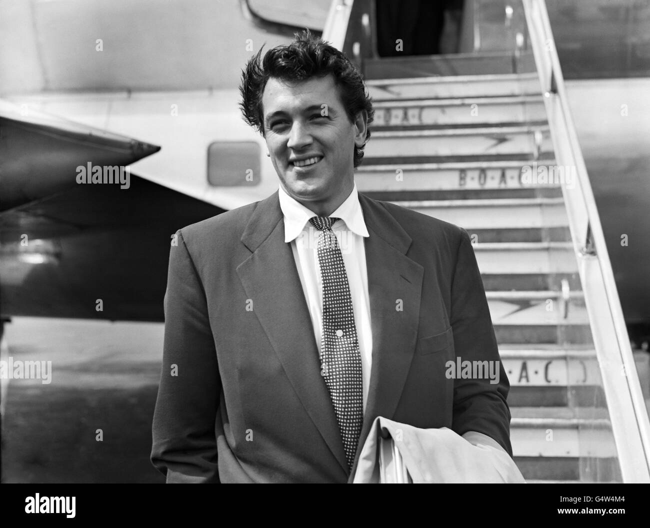Rock Hudson - London Airport. Rock Hudson arrives at London Airport from the United States. Stock Photo