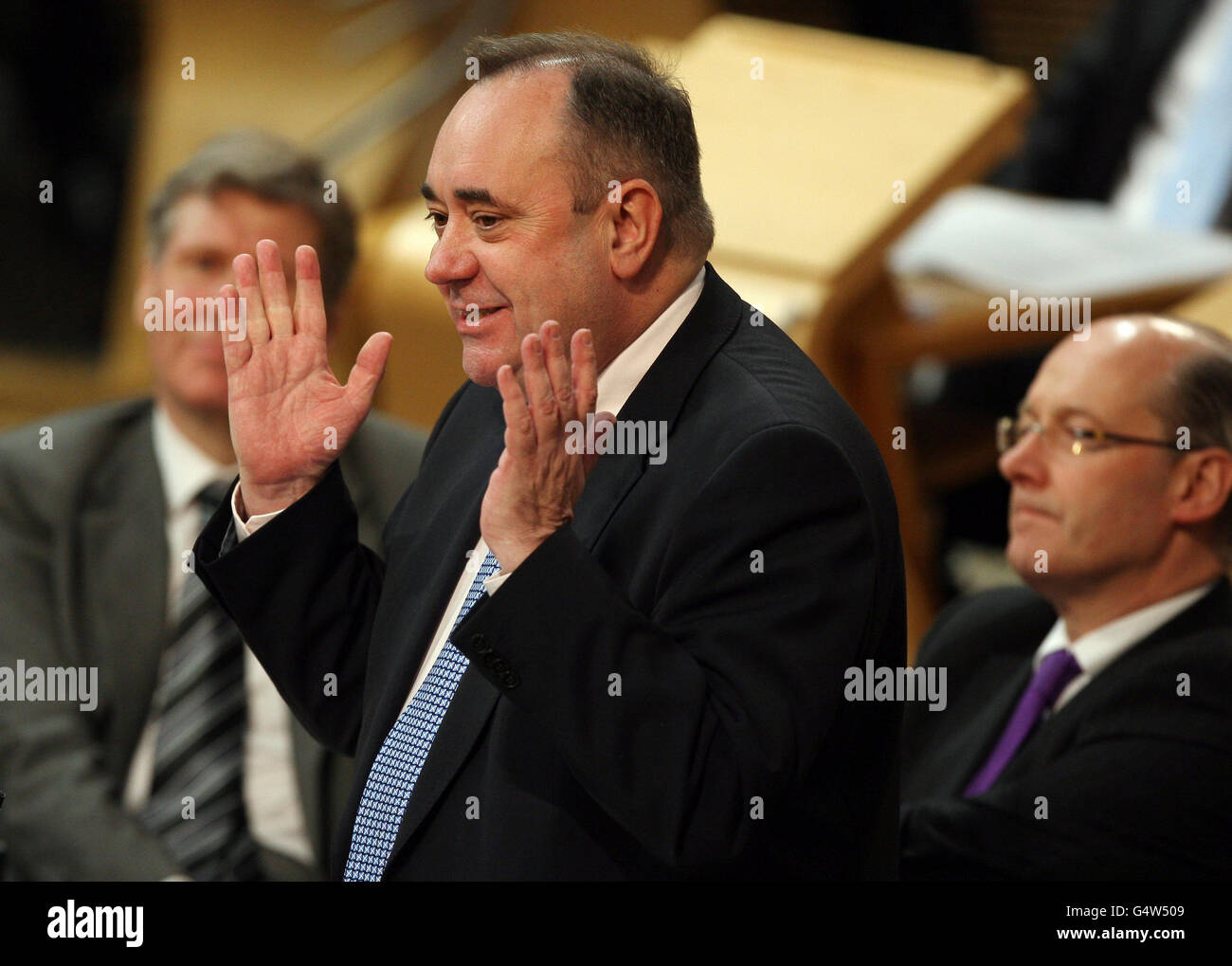 Scotland's First Minister Alex Salmond speaks during First Minister's Questions at the Scottish Parliament in Edinburgh. Stock Photo