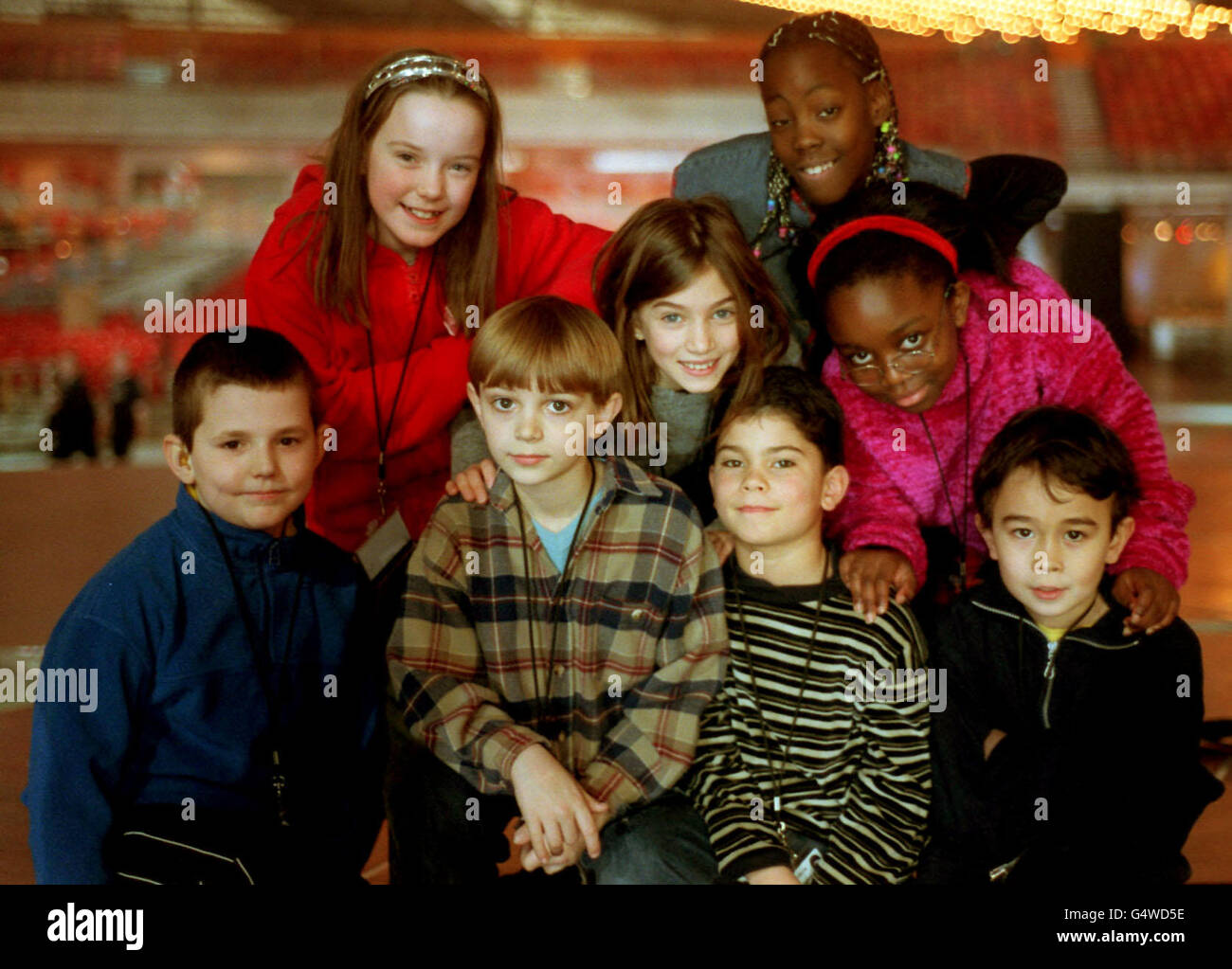 Front L-R: Jack Arold, Jonathon Gibson, Jay Thomas Heiglwere, and Toby Cunningham. BackL-R: Carrie Millard, Jade Moulla, Rio-Raquel Ramsay, and Jade Osei-Osego at the Millennium Dome for their own penultimate rehearsal for the Opening Celebrations. * The children, aged between eight and ten years old, from the Meridian School in Greenwich, will have an impressive VIP role on the night, as they will be sitting with the Queen throughout the evening's celebrations. Stock Photo