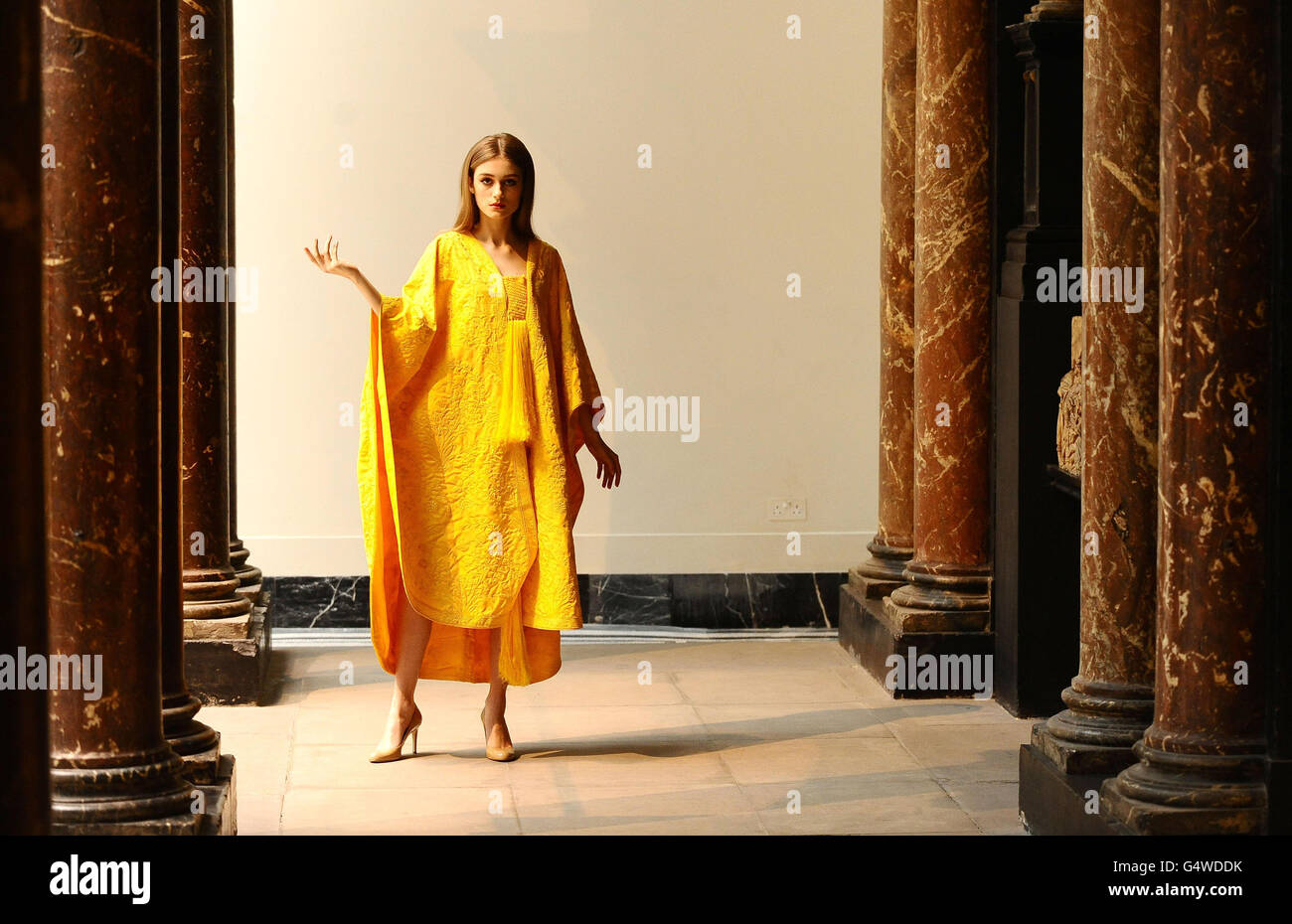 Bianca Gaurilas wears a Golden Spider silk cape, which is made from the golden  silk of 1.2million spiders, as it goes on display at the V&A Museum, London  Stock Photo - Alamy