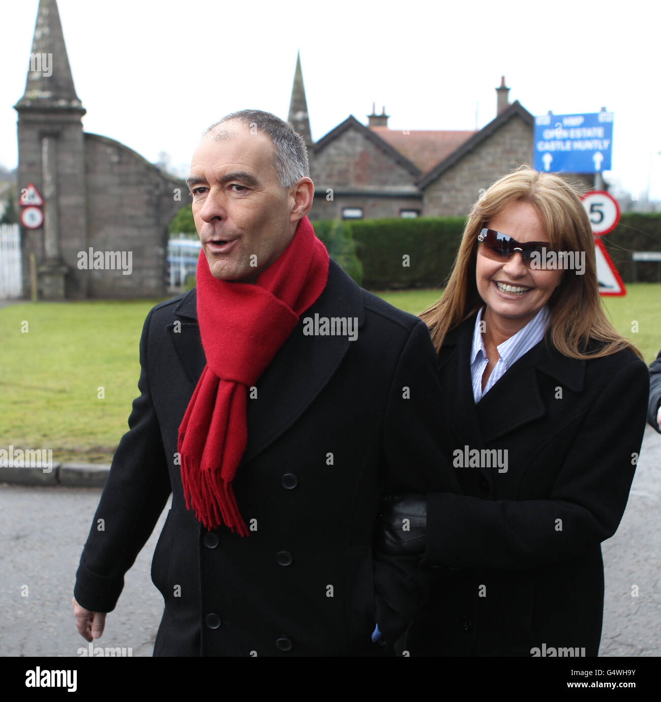 Former MSP Tommy Sheridan accompanied by his wife Gail, leaves Castle Huntly Prison,near Dundee, after serving just over one year of his three-year sentence for lying under oath. Stock Photo