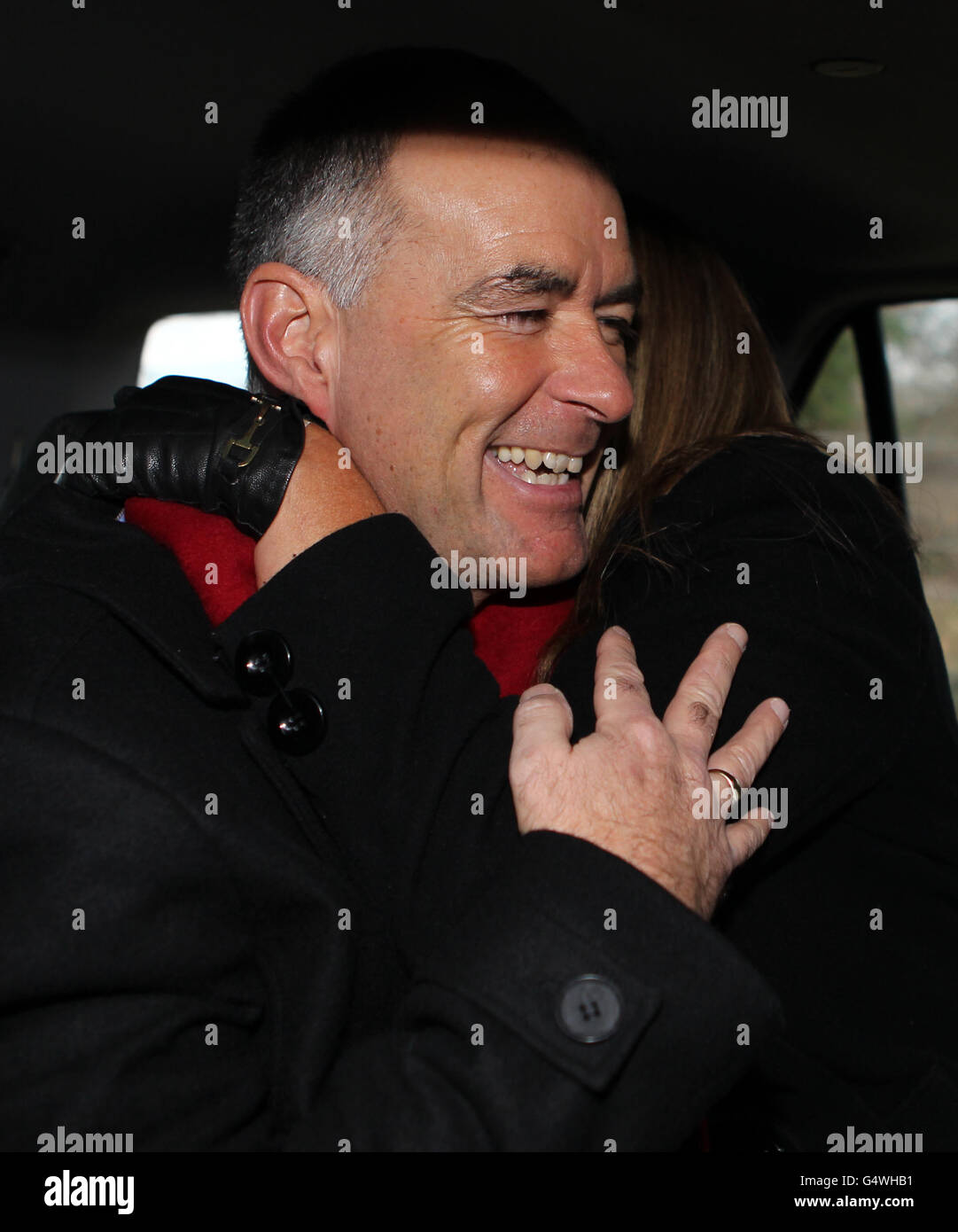 Former MSP Tommy Sheridan is hugged by his wife Gail, as he leaves Castle Huntly Prison,near Dundee, after serving just over one year of his three-year sentence for lying under oath. Stock Photo