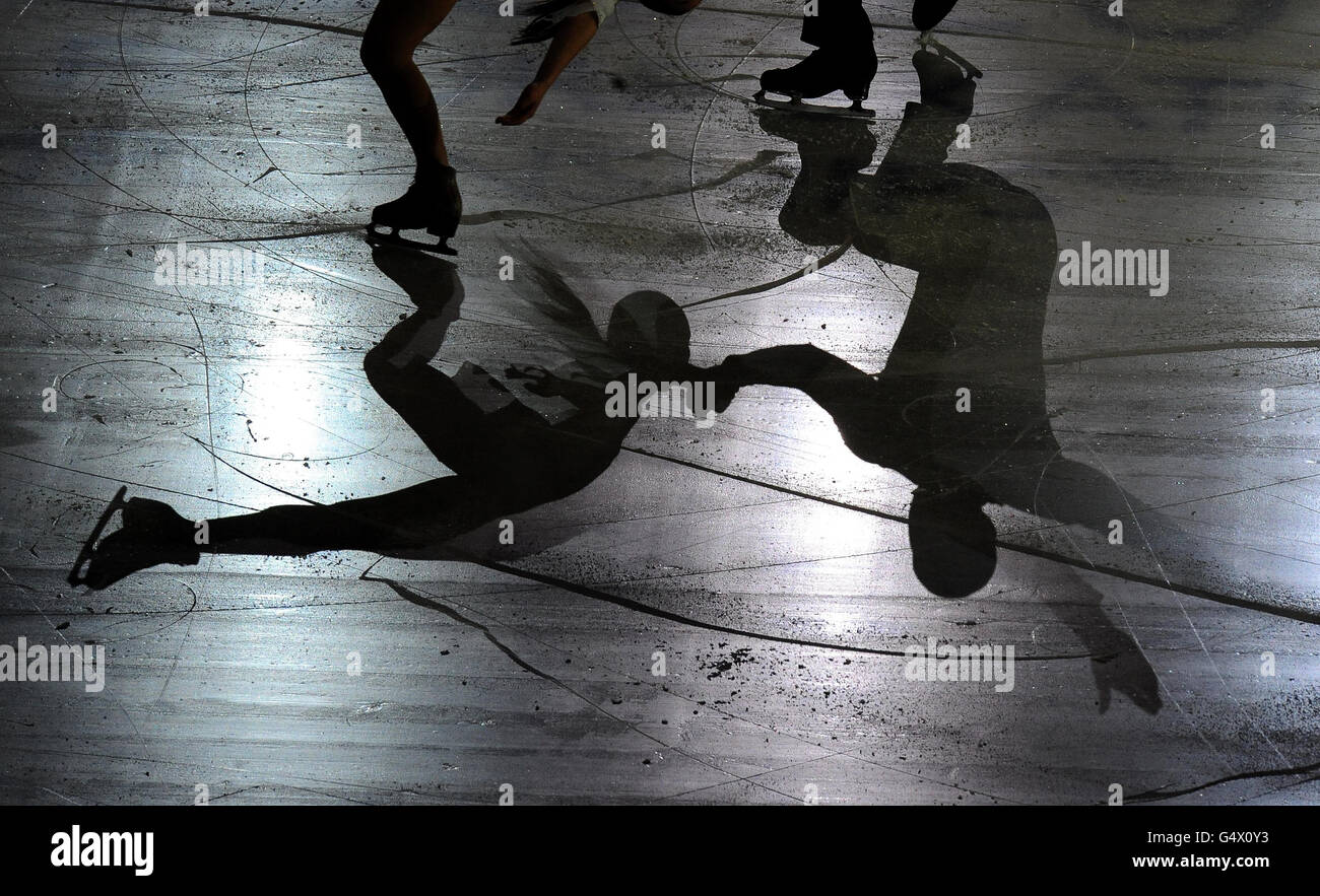 Ice skaters shadows in the Gala Exhibition during the European Figure Skating Championships at the Motorpoint Arena, Sheffield. Stock Photo