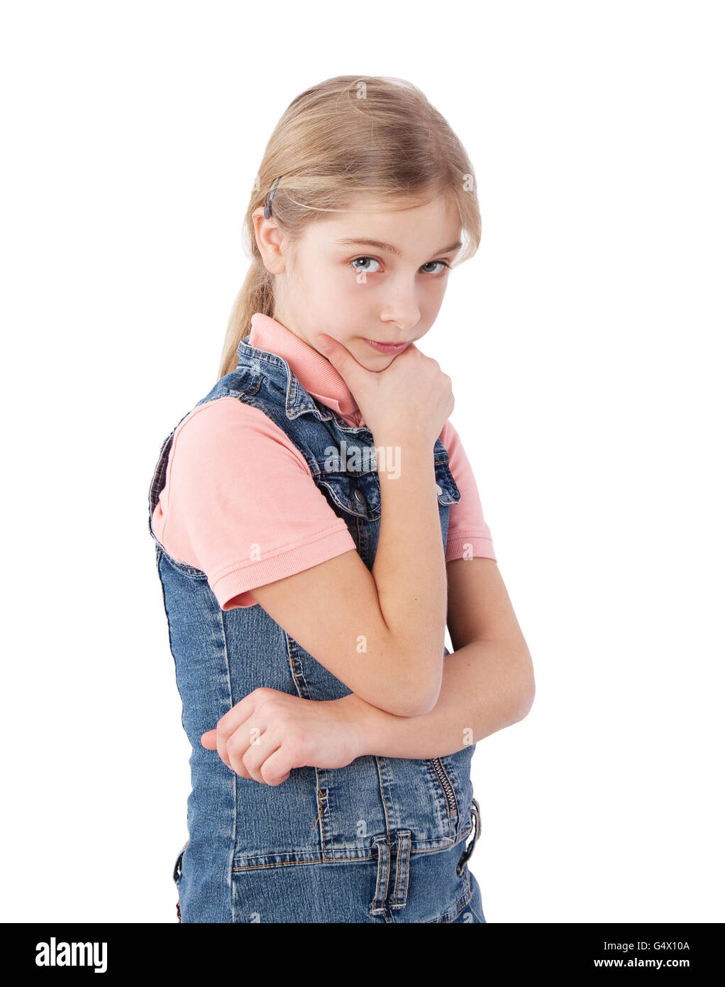 young girl with hand on chin Stock Photo