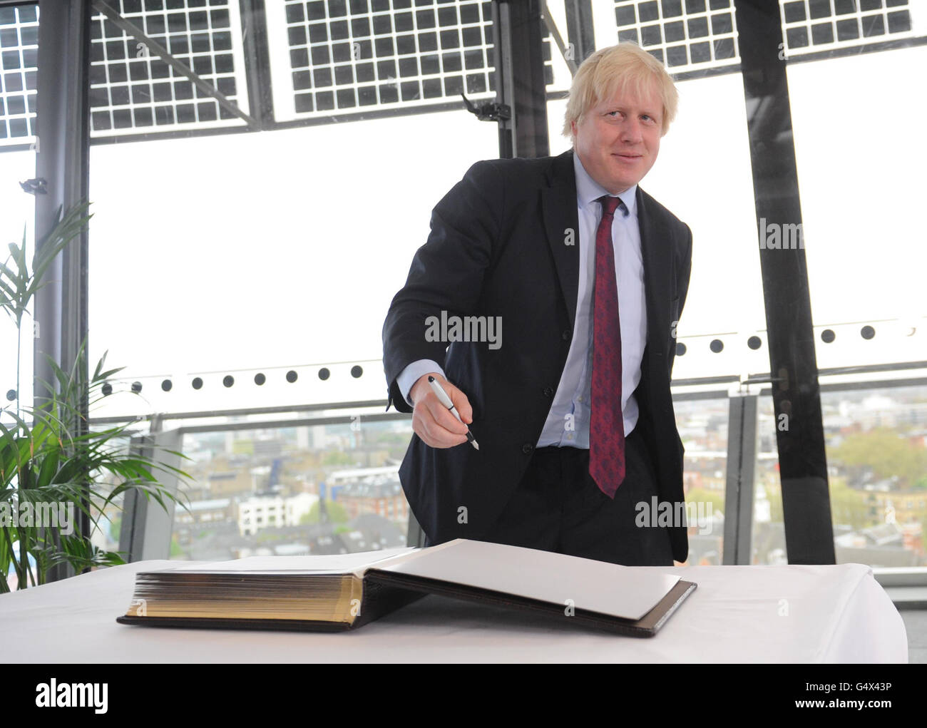 Boris Johnson signs the Declaration of Acceptance of Office to be Mayor of London at City Hall in London. Stock Photo