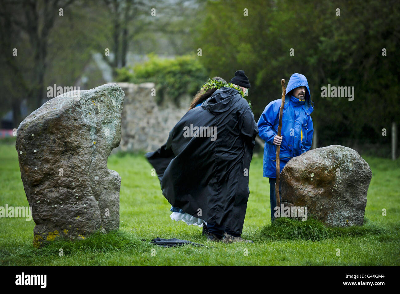 As dancers weave around the maypole at avebury stone circle hi-res ...