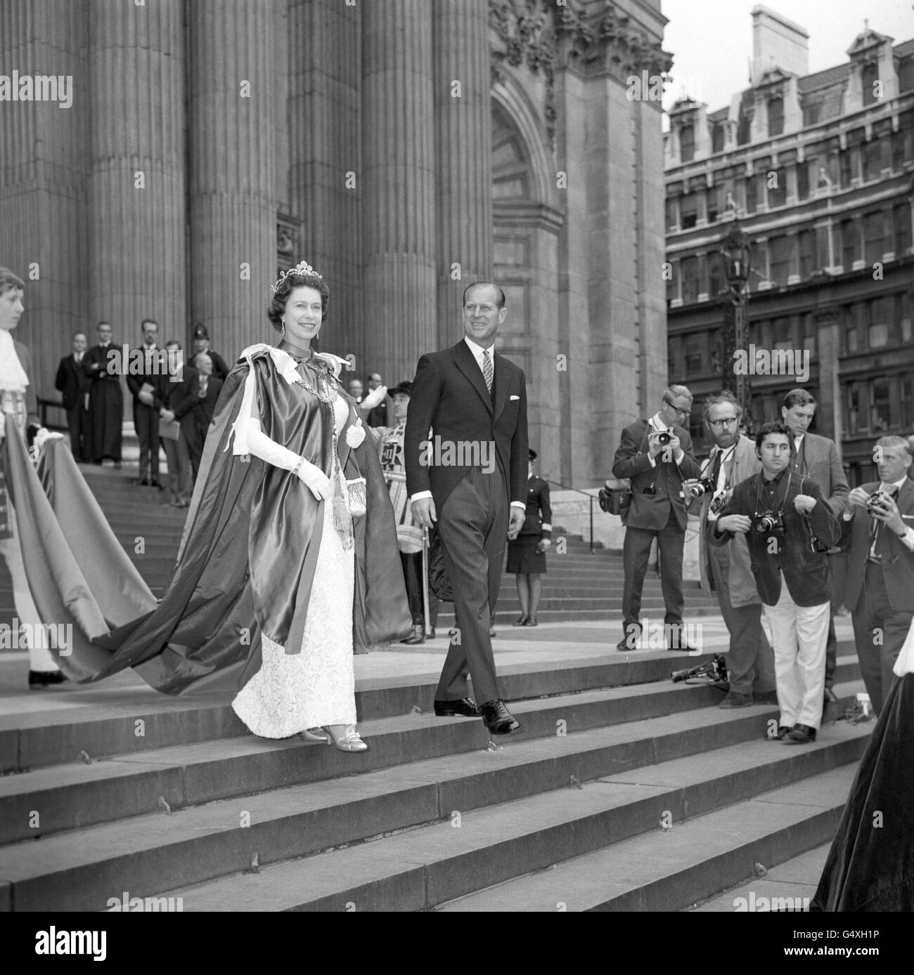 Queen Elizabeth II and the Duke of Edinburgh leaving St. Paul's Cathedral after the 150th Anniversary of the Order of St. Michael and St. George. Stock Photo