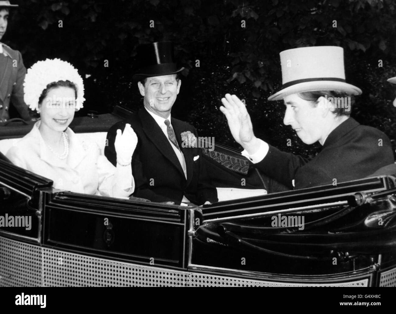 Queen Elizabeth II, the Duke of Edinburgh, and the Prince of Wales at Royal Ascot. Stock Photo