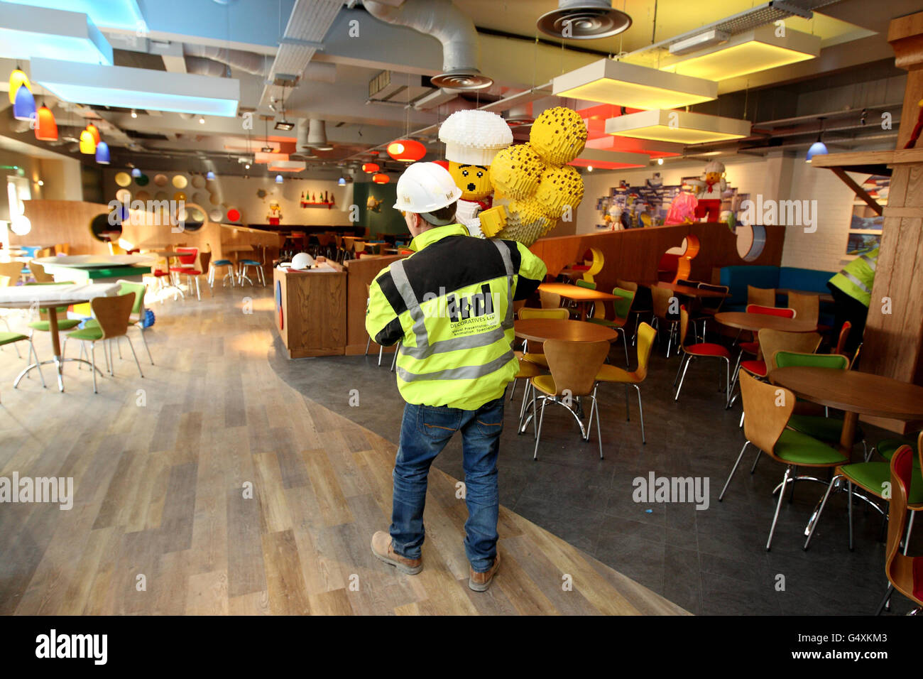 Matt Kitchen-Dunn carries a figure in the restaurant of LEGOLAND Windsor resort's new hotel. Stock Photo