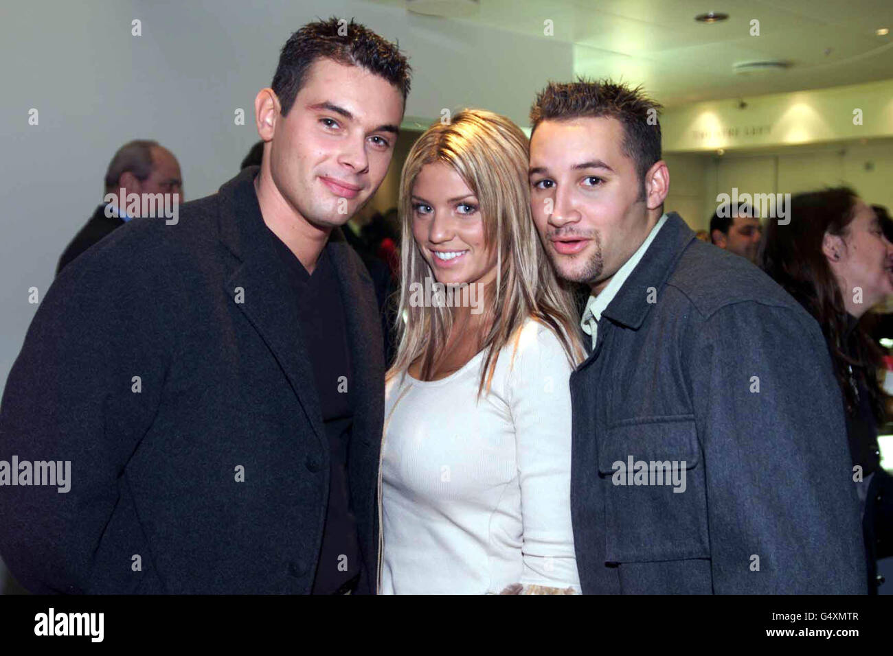 Model Jordan with Mark Baron (left) and Dane Bowers from pop group Another Level attend the launch of the Moet & Chandon London Restaurant Awards, at the Royal Opera House, London. Stock Photo