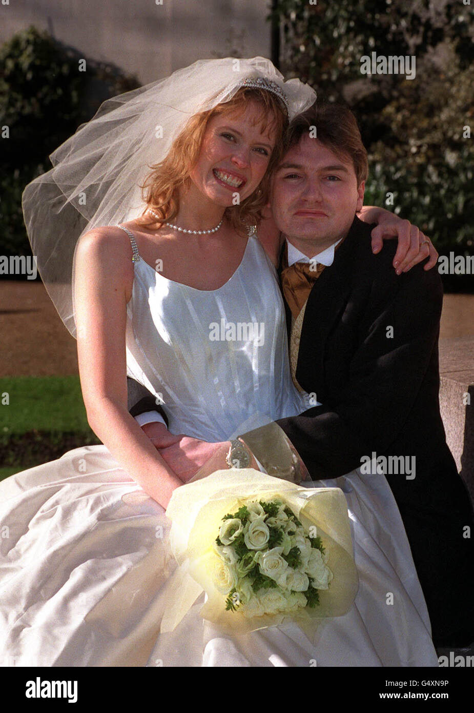 Jonathan Brignall, 30 and his bride Joanne Phair, also 30 who are the winners of Wedding and Home Magazine's Bride of the Year 2000 competition. Joanne supported Jonathan through his paralysing disease, Guillain-Barr syndrome. * Jonathan actually proposed to her using sign language from the intensive care unit. Jonathan, who was in the same class as Joanne at infant school, is now making a good recovery. Stock Photo