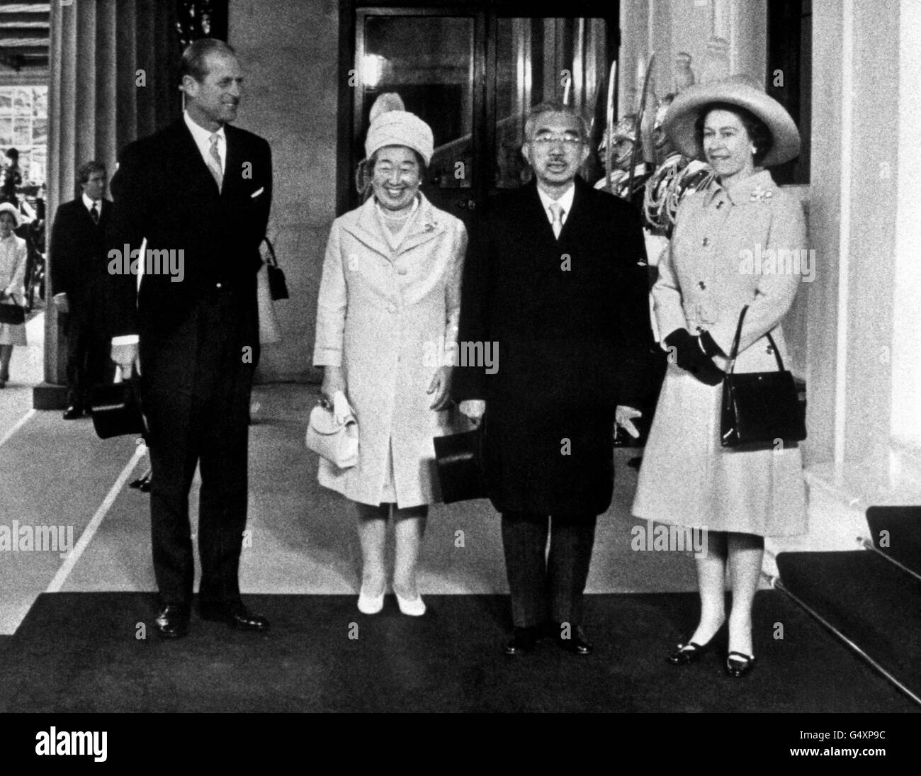 Queen Elizabeth II and the Duke of Edinburgh with Emperor Hirohito of Japan and his wife Empress Nagako, on their arrival at Buckingham Palace, at the start of their State visit to Britain. Stock Photo