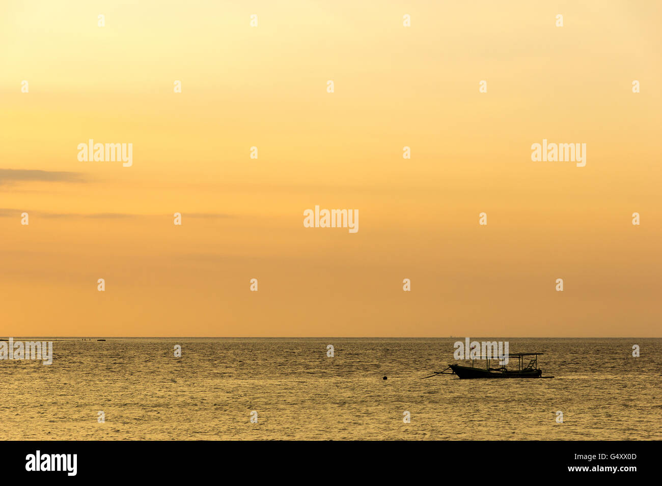 Indonesia, Nusa Tenggara Barat, Lombok Utara, boats on the island of Pulau Gili Meno at sunset Stock Photo