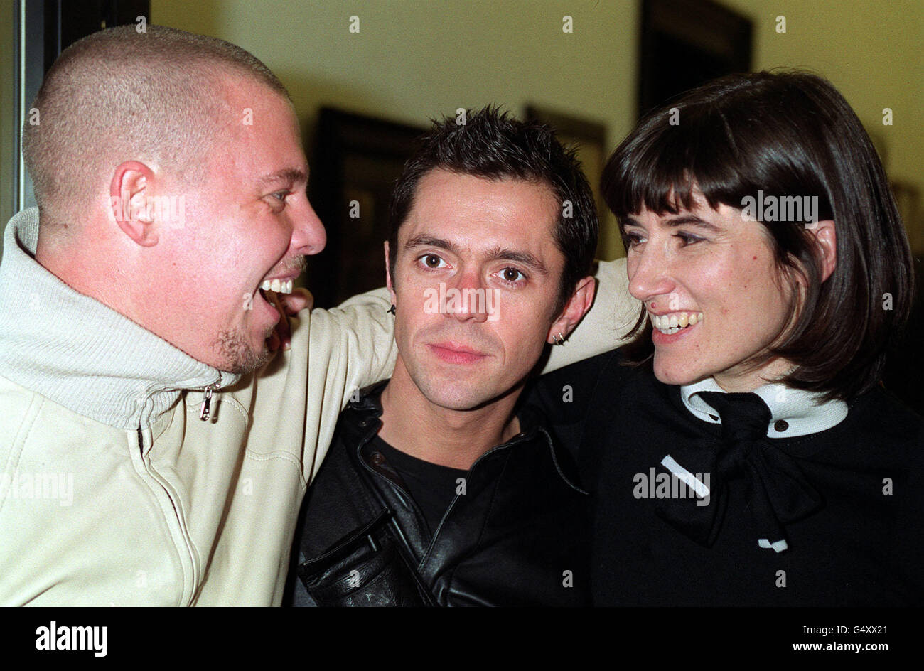 Fashion designer Alexander Mcqueen (left) with designer Bella