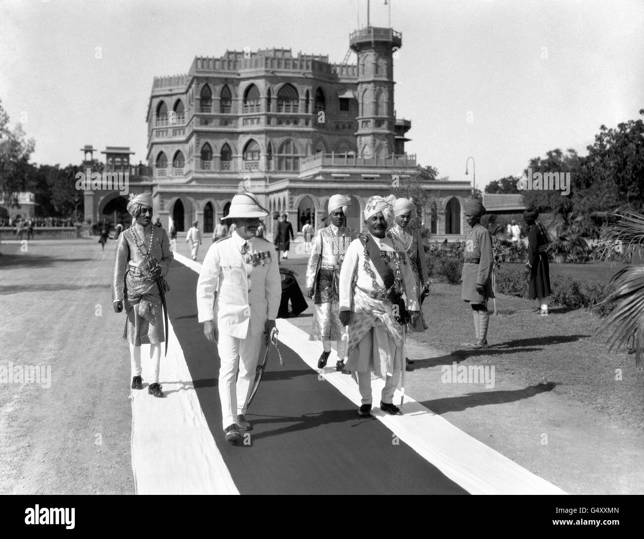 The Prince of Wales' tour of Japan and India. The Maharajah Regent (r) - Sir Pertub Singh - returning with a British official from the palace after his visit to the Prince of Wales. Stock Photo