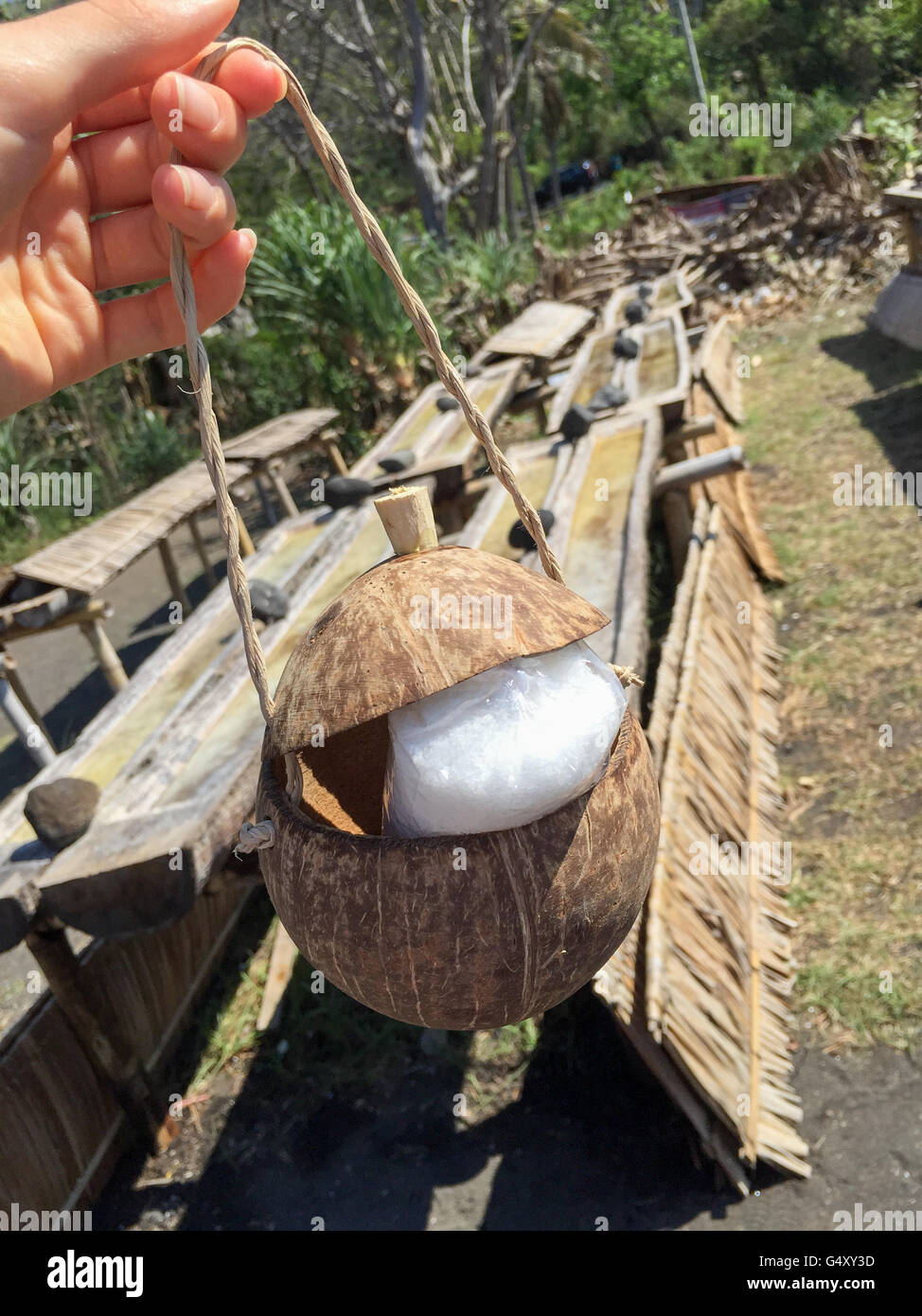Indonesia, Bali, Klungkung, salt in coconut bowl Stock Photo
