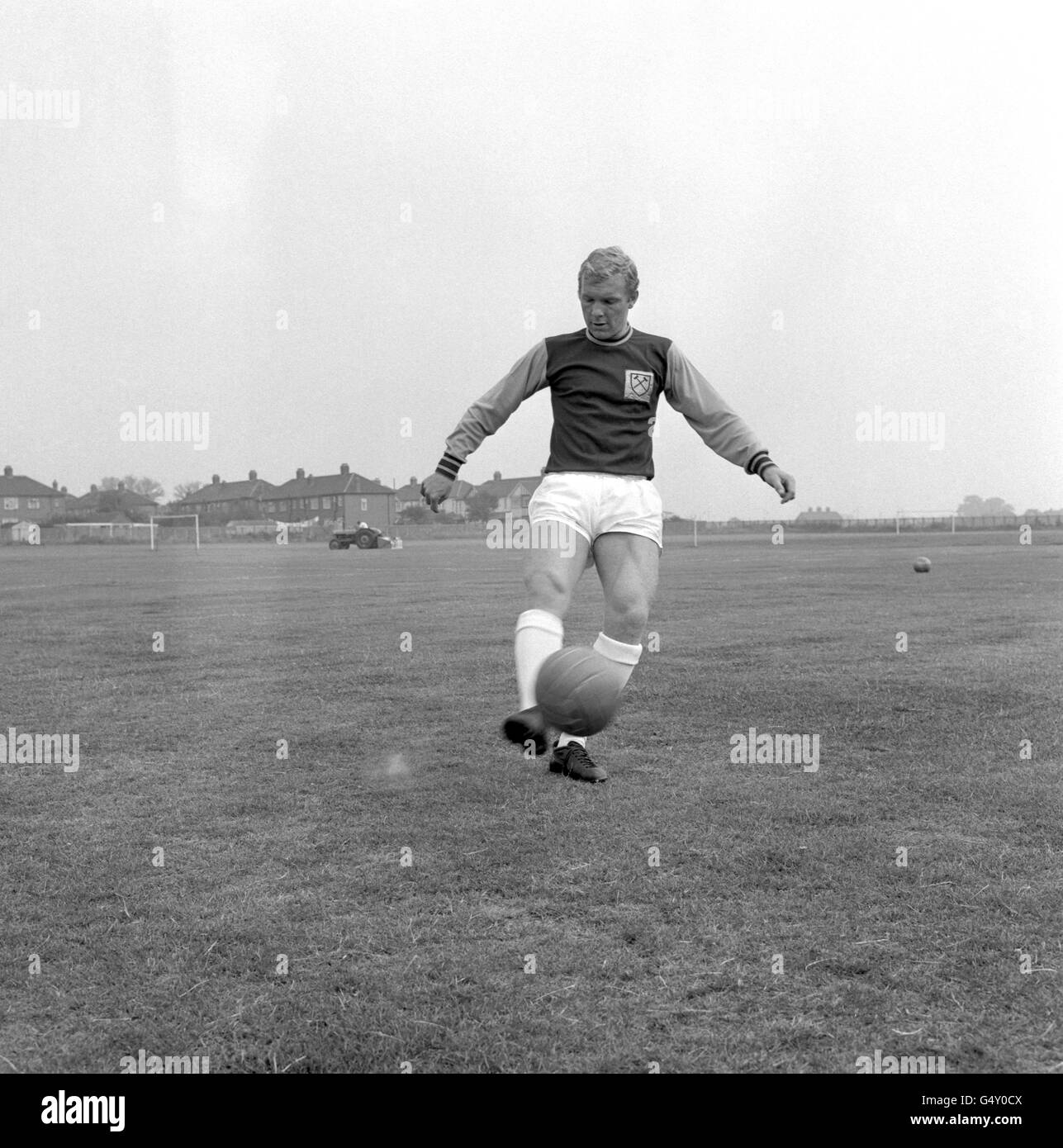Bobby Moore/Training. Captain of West Ham United and England, footballer Bobby Moore juggling a football in training. Stock Photo
