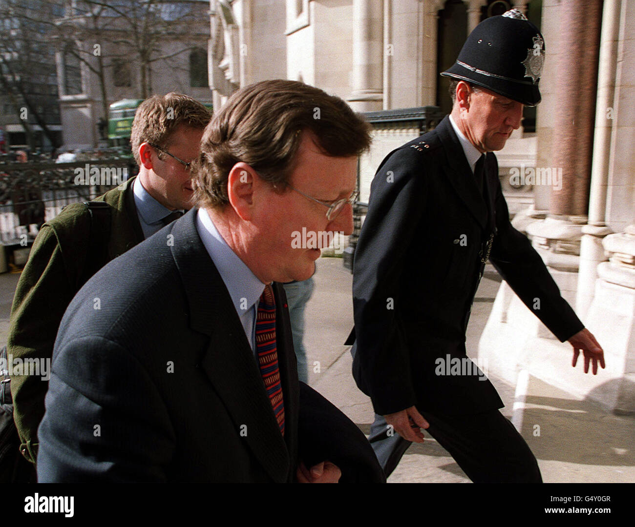 Northern Ireland's First Minister David Trimble arrives at the High ...