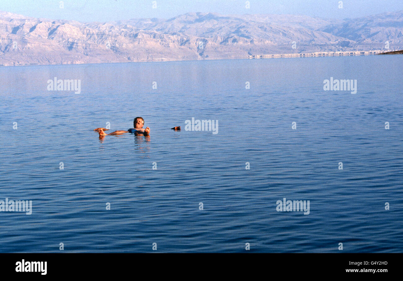 People floating in the salty water Stock Photo