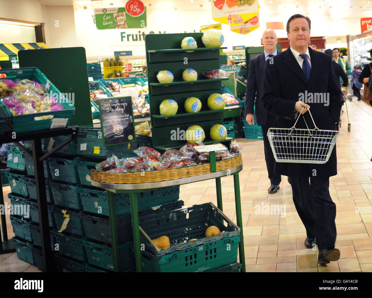 Prime Minister David Cameron makes an impromptu stop at a Morrisons supermarket in Plymouth, where he bought fish and vegetables for a family dinner. Stock Photo
