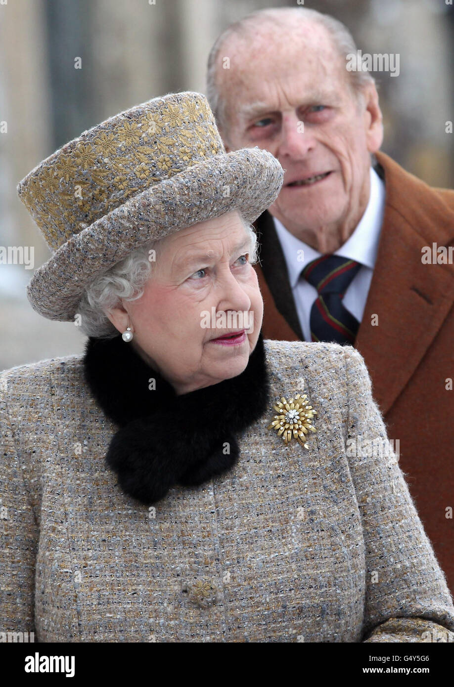 Britain's Queen Elizabeth II and the Duke of Edinburgh attend the church of St Peter and St Paul at West Newton, Norfolk. Stock Photo