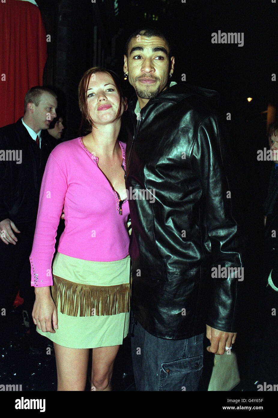 Radio one DJ and television presenter Sara Cox and her fiance Leeroy Thornhill, from the dance band The Prodigy, arriving at the party after the European Gala premiere of the film The Beach, at The Empire cinema in Leicester Square, London. Stock Photo