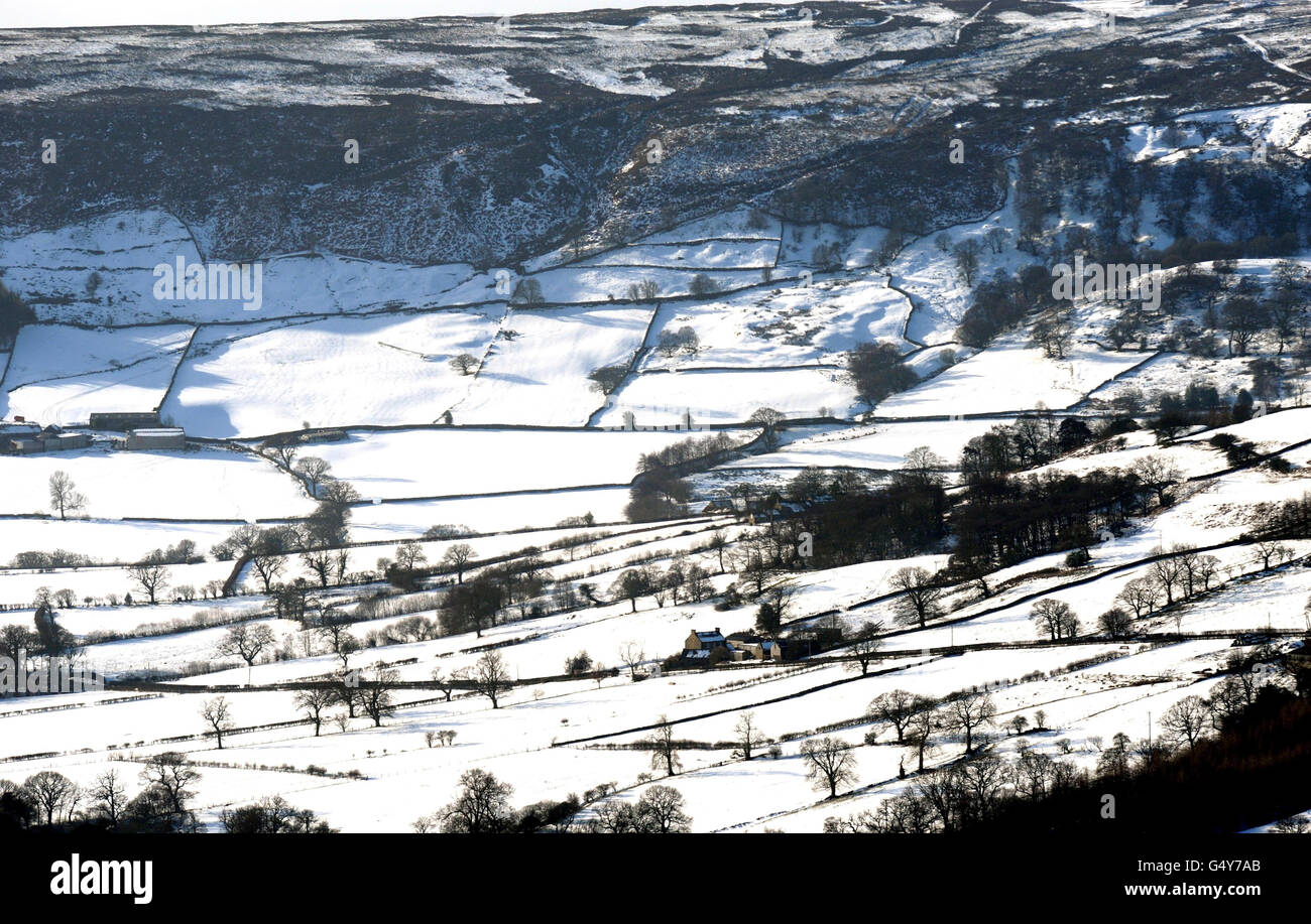 Snow covered fields near Farndale, North Yorkshire as Britain's big freeze shows little sign of relenting with sub-zero temperatures set to bring more misery to commuters up and down the country in the coming days. Stock Photo