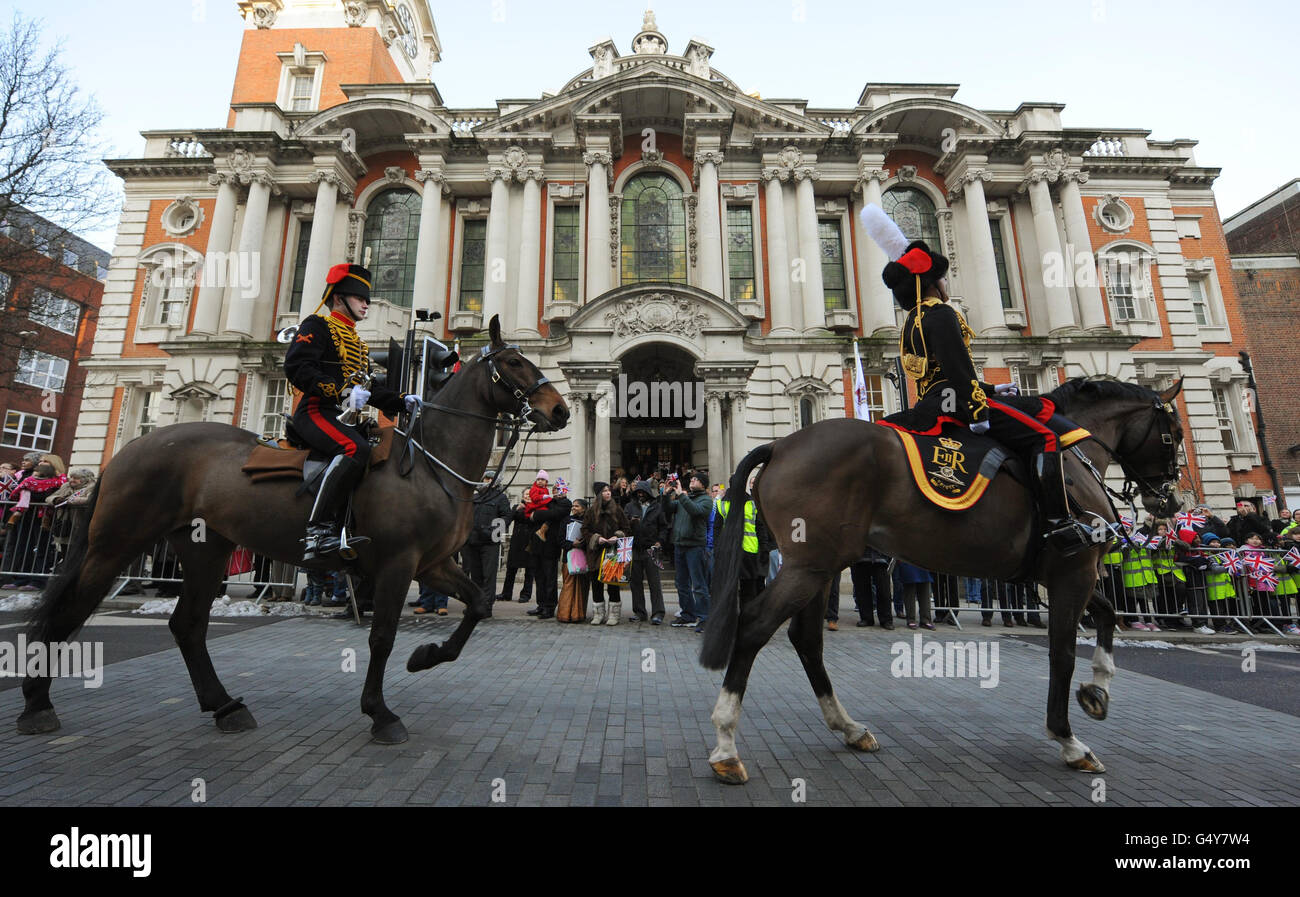 Troops from the King's Troop Royal Horse Artillery pass Woolwich Town Hall, as they parade through Woolwich, in south east London, before taking up residence at Napier Lines, a new purpose-built barracks and training centre in Woolwich Garrison. Stock Photo