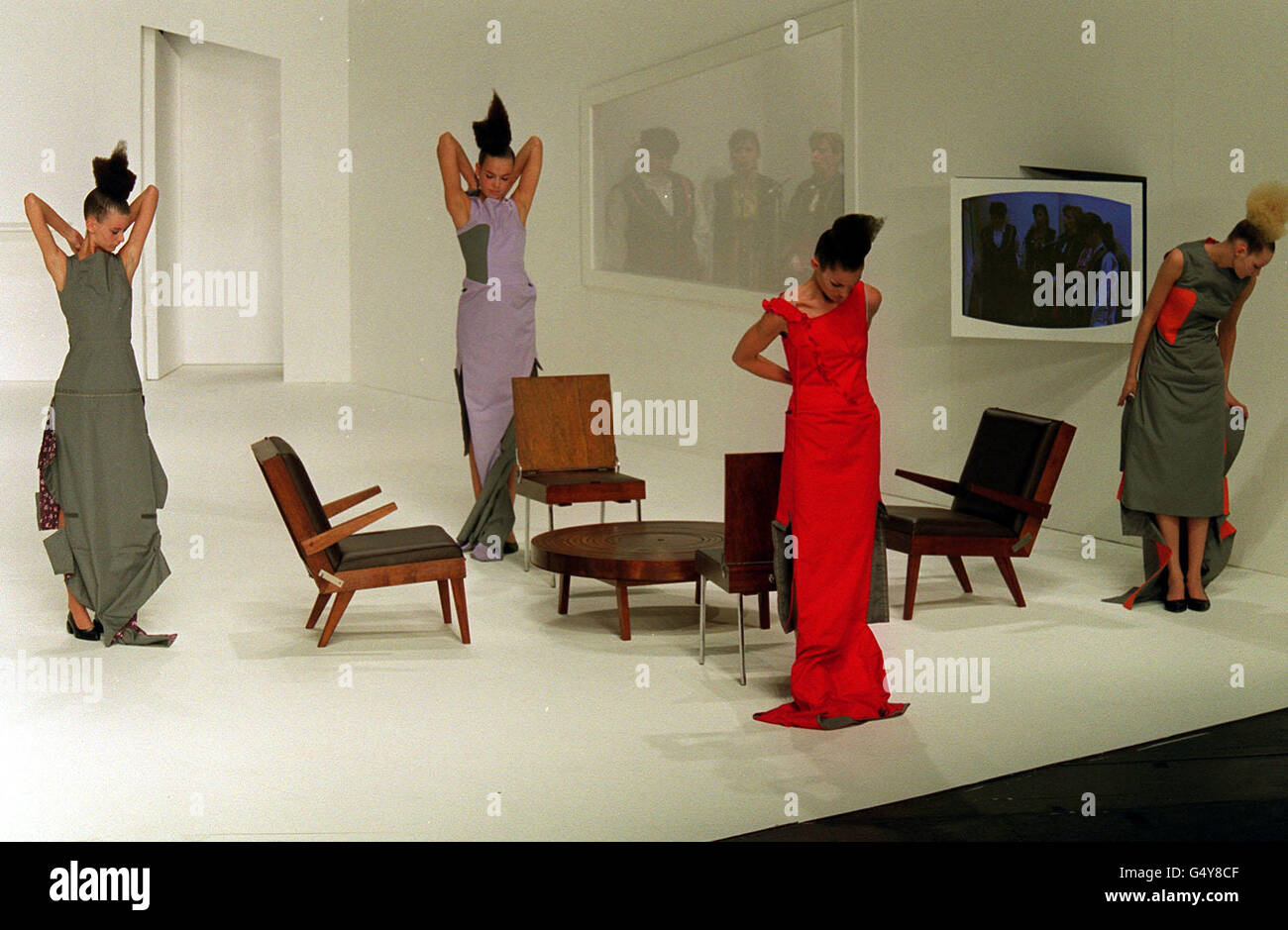 Models wear creations from designer hussein chalayan autumn winter