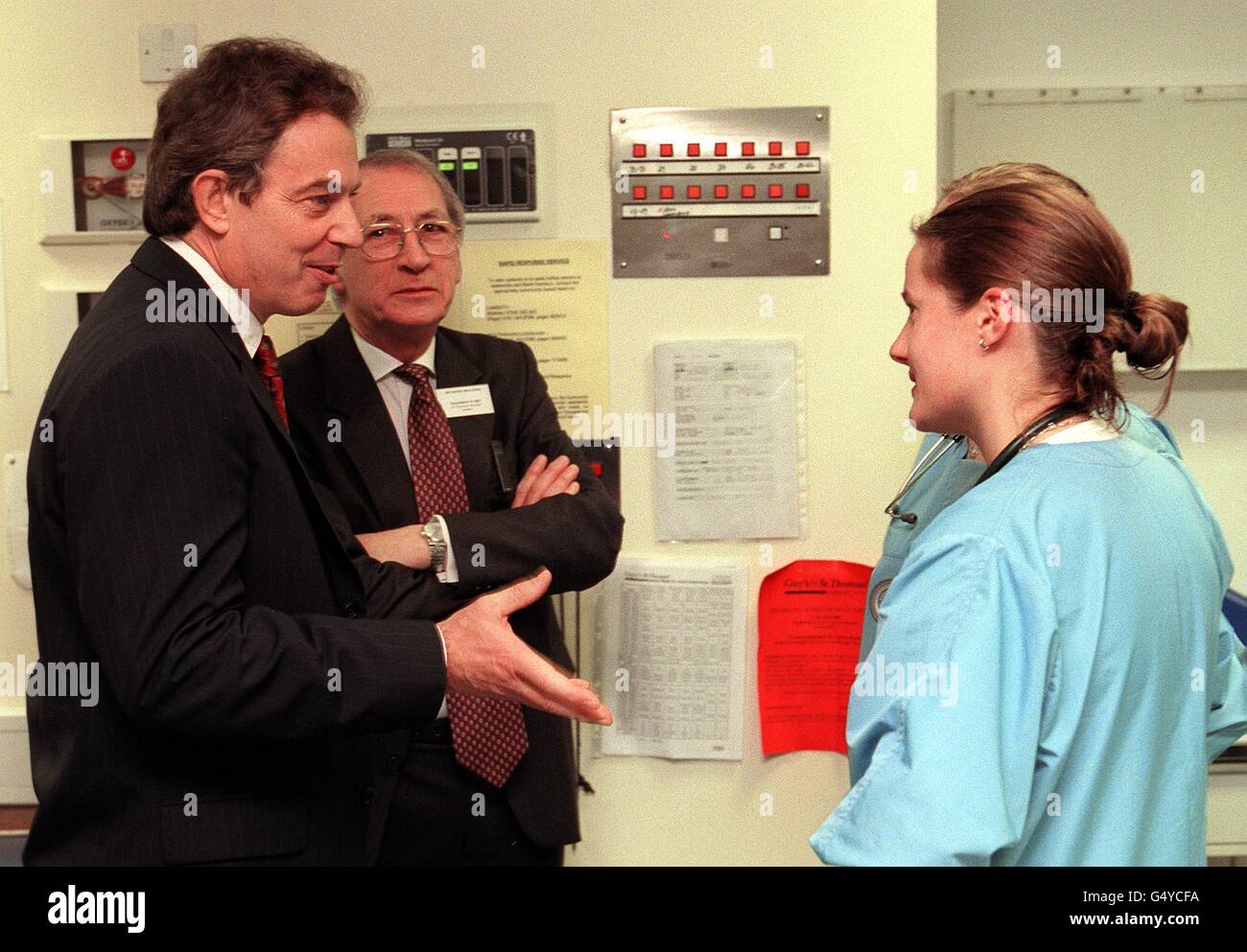 Prime Minister Tony Blair talks to an nurse as he opens a 1 million upgraded Accident & Emergency unit at London's St Thomas's Hospital. During the visit Mr Blair promised a revolution in casualty care, with a new 5-point plan designed to end the 'lottery of care'. * which meant patients' treatment depended on how efficient their local hospital was'. Stock Photo