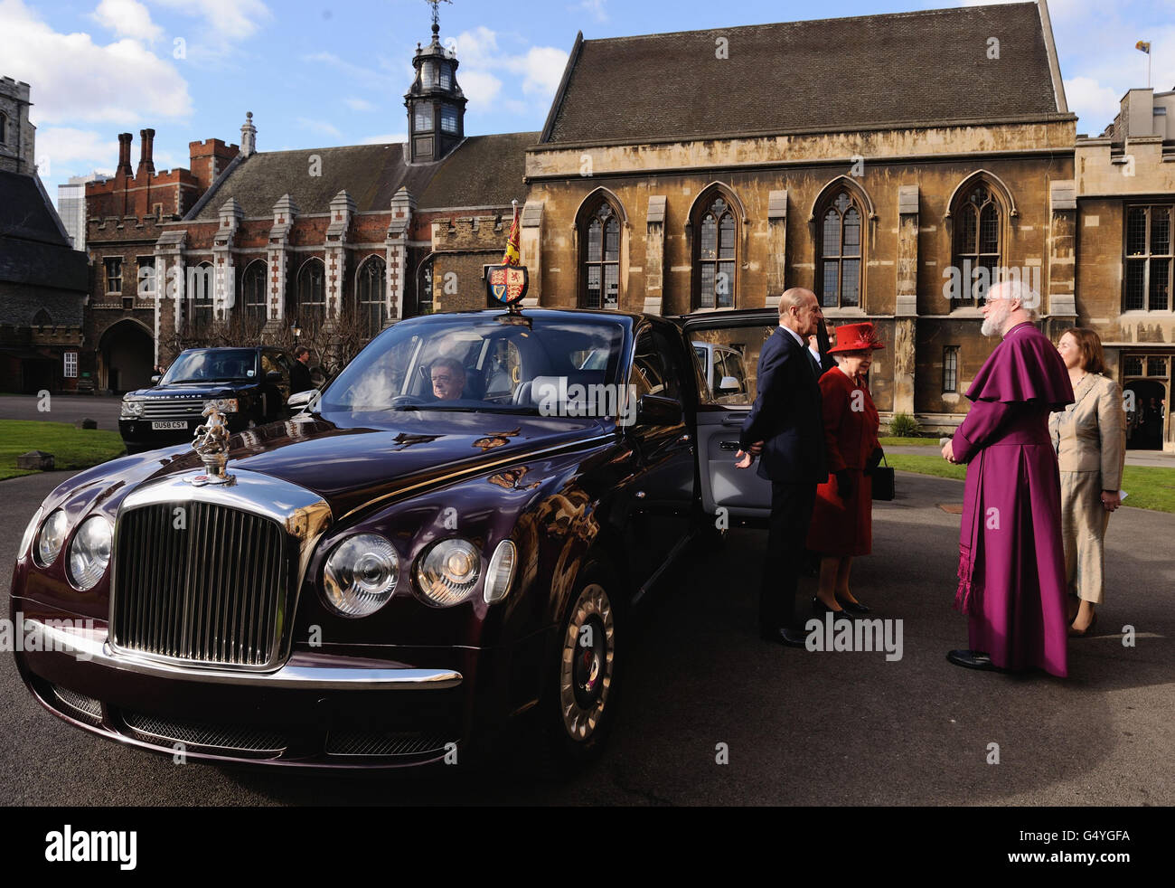 Queen Elizabeth II and the Duke of Edinburgh are greeted by the ...