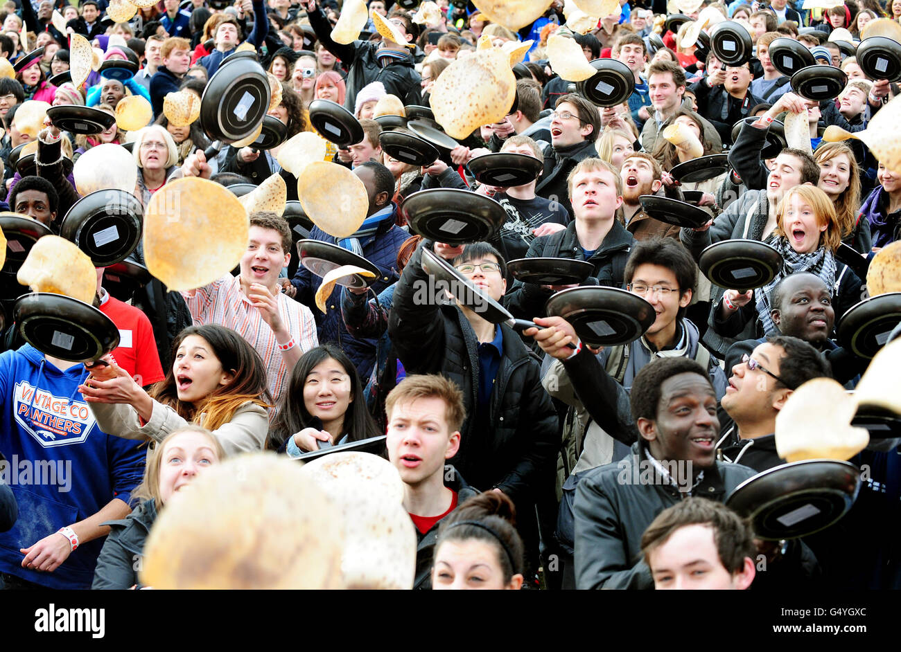Staff and students at the University of Sheffield take part in The Big Flip and break the Guinness World Record for the most people flipping pancakes at The Endcliffe Village, Sheffield. Stock Photo