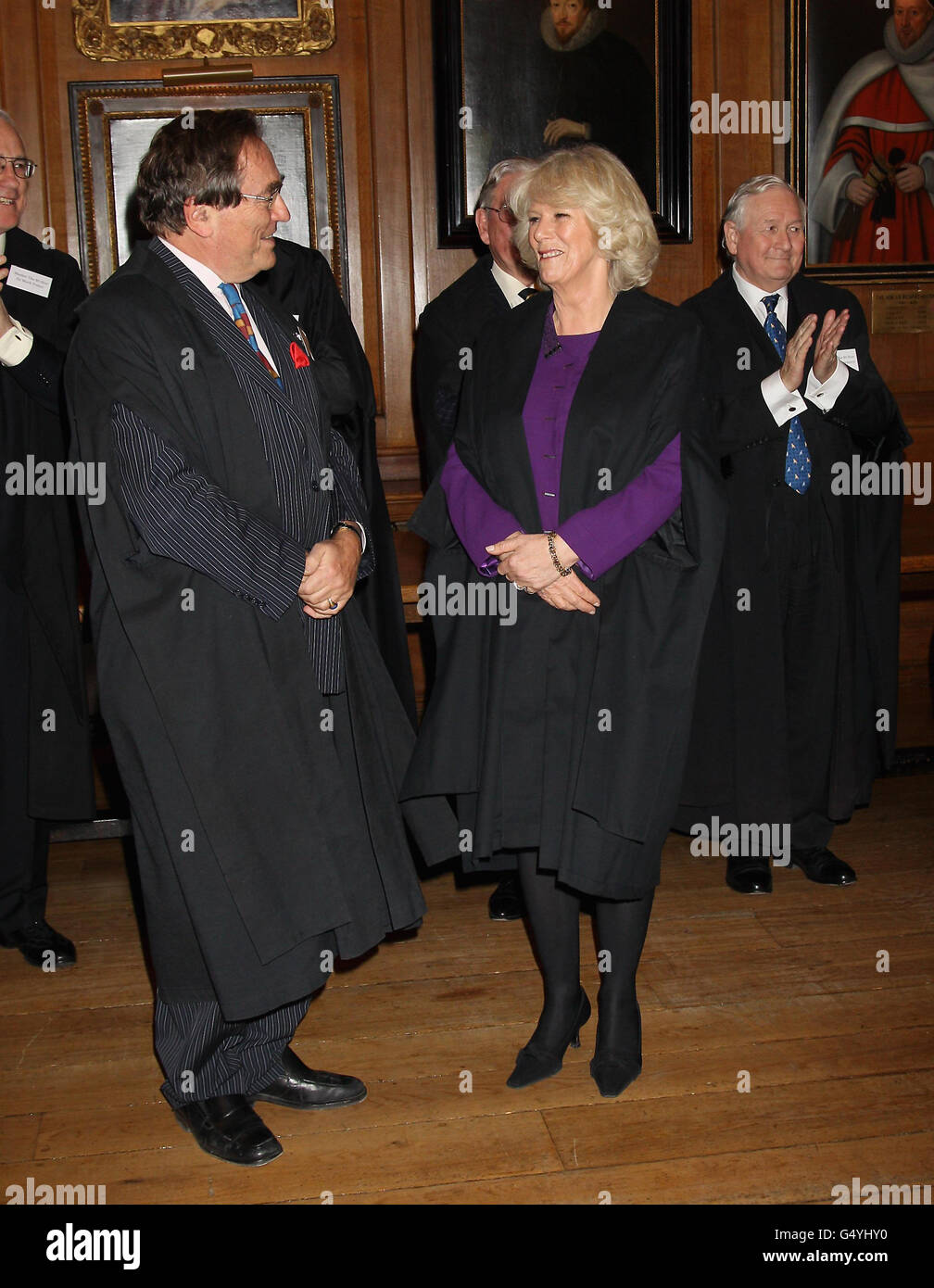 The Duchess of Cornwall wears a masters gown as she is made an Honourable Royal Bencher at the Honourable Society, Gray's Inn, London, where she spoke of the importance of challenging the brain in old age as she was made an honorary barrister. Stock Photo