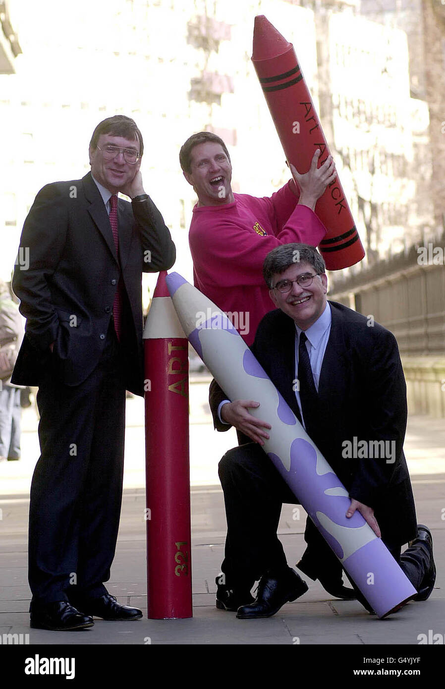 Managing Director of Britt Allcroft William Harris (L), Art Attack presenter Neil Buchanan and Britt Allcroft's Commercial Director Charles Falzon in London, where they announced the company's acquisition of Media Merchants Group. * The buyout for up to 14 million resulted in Britt Allcroft, owner of Thomas the Tank Engine and Captain Pugwash, adding a host of new programmes to its stable, which will include children's art and crafts series Art Attack and the ZZZAP! and It's a Mystery programmes shown on ITV to Britt's expanding portfolio. Stock Photo