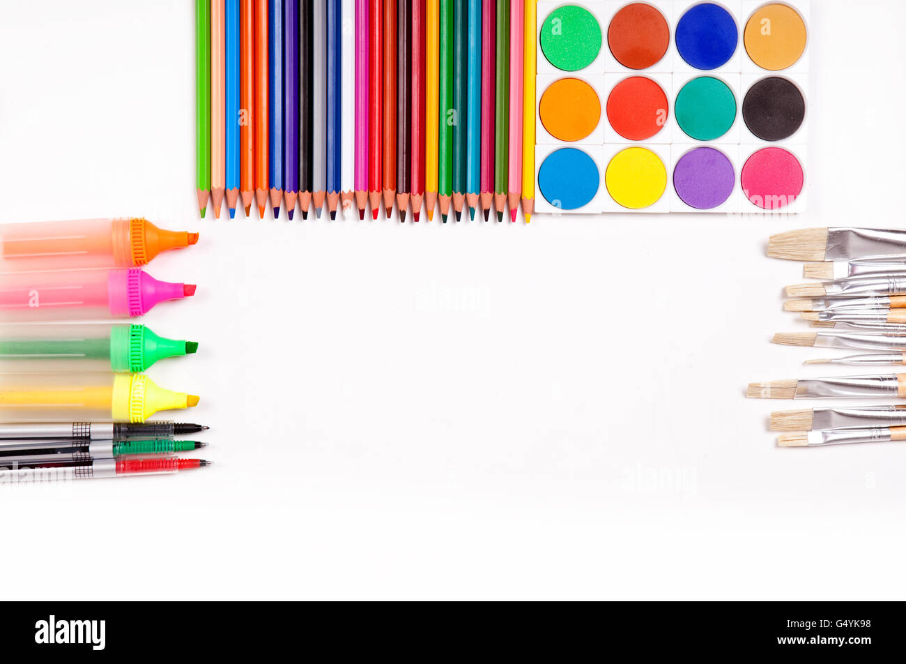 colorful painting and drawing materials on white background with copy
