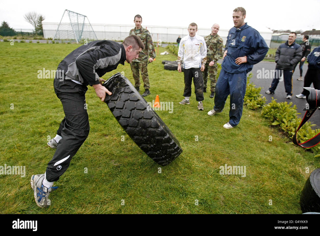 Ireland's Joe Ward carries a tyre during the Irish Defence Forces endurance and team building assault course at the Curragh Army Camp, Curragh. Stock Photo