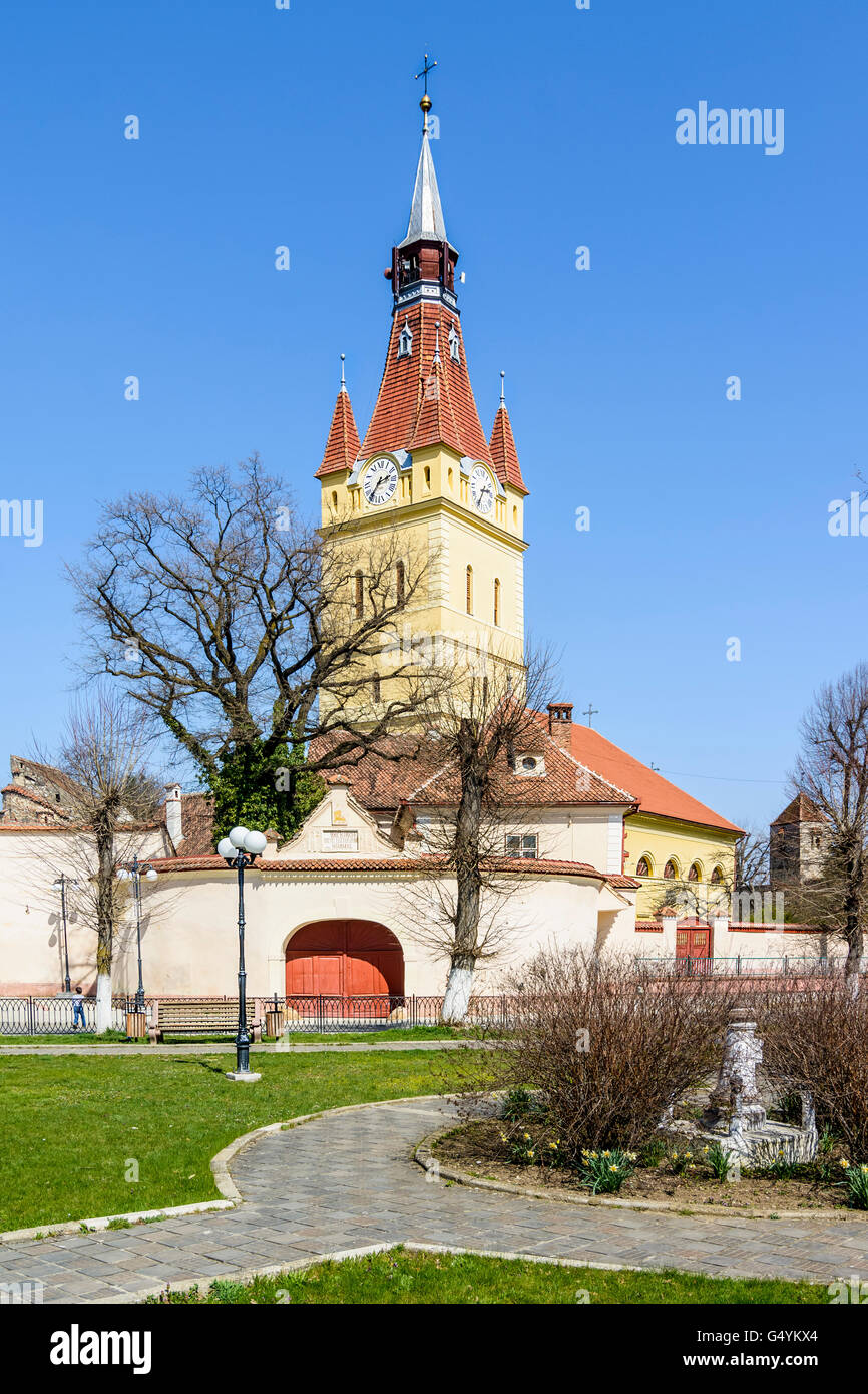 Street view of the fortified church of Cristian, Brasov district, Romania into a sunny afternoon. Stock Photo