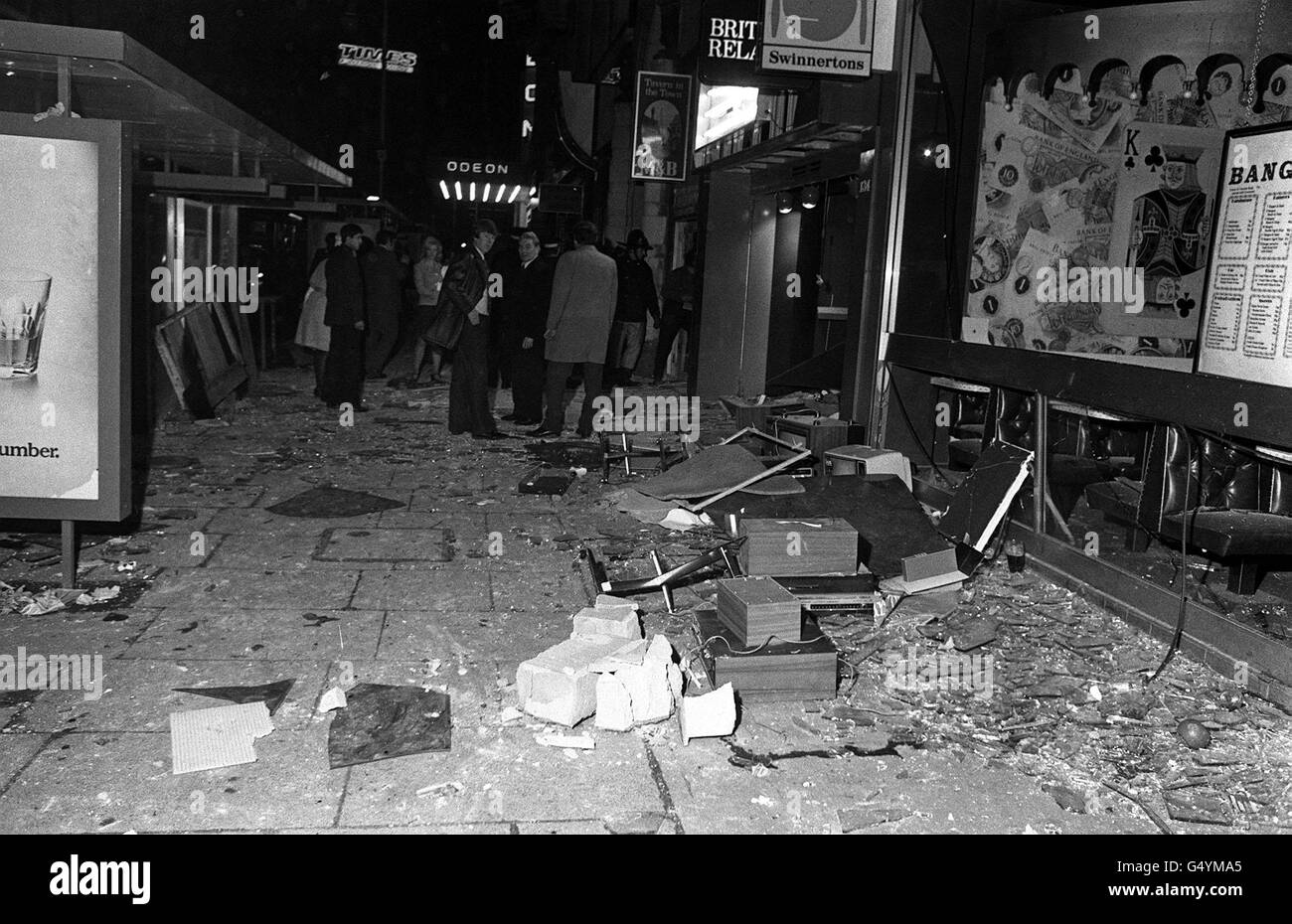 A bomb damaged and shattered bus shelter in New street, Birmingham, after two pubs were blitzed. Thirteen people were killed and an unknown number injured. Stock Photo