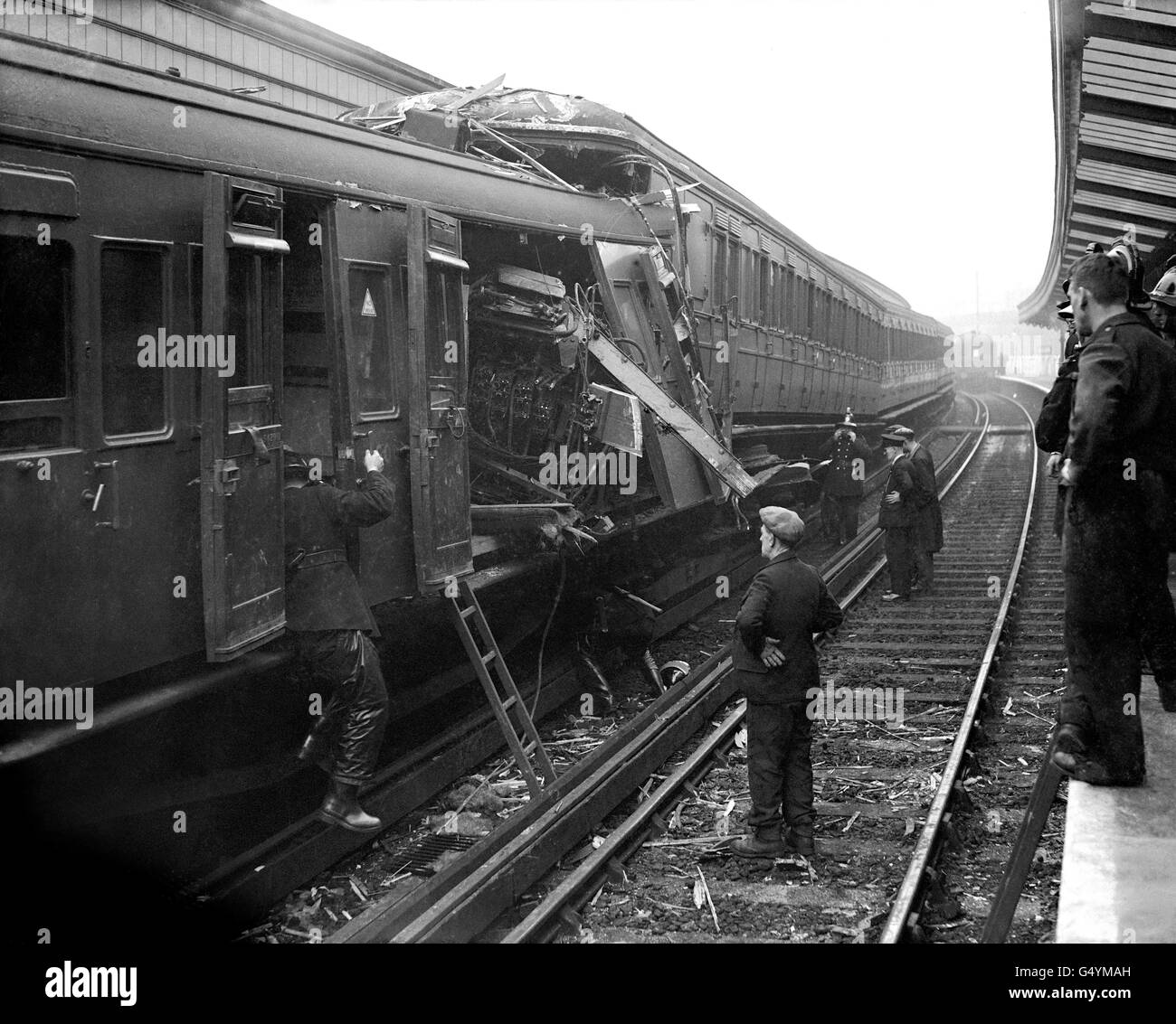 Railway lines are strewn with wreckage after a train from Charing Cross to Dartford, ran into the back of a Cannon Street to Gravesend train, standing in Woolwich Arsenal Station, London at 12.53 pm. Two people were killed, and two people were injured. Stock Photo