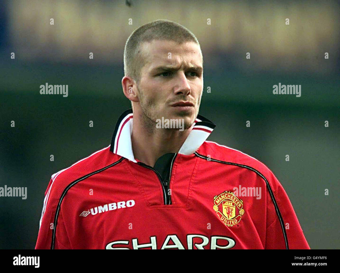 Manchester United's David Beckham shows off his new hair style during the Premiership football match against Leicester City at Filbert Street, Leicester. Stock Photo