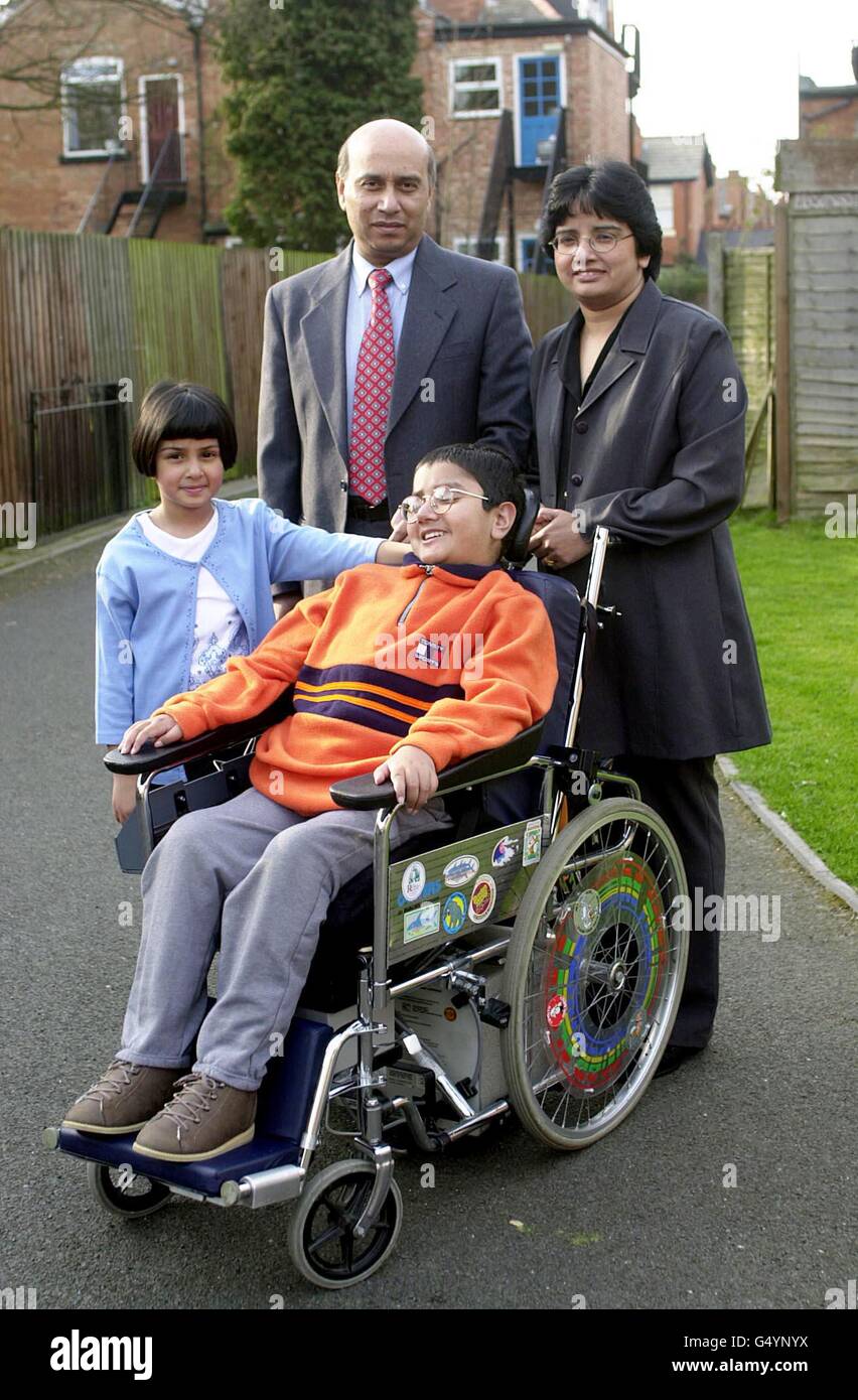 Faisal Luhar aged 10 yrs with his parents Yusuf and Maimuna and sister Leyla aged 6. In November 1993, when Faisal was three years old, he was hit by a car which left him a tetraplegic and unable to breathe without a ventilator. Faisal was awarded 5.1 million. * in what is believed to be one of the highest damages settlements for a personal injury claim. The award, made at the High Court sitting in Birmingham, will help provide 24-hour care for young Faisal Luhar and buy him medical and educational equipment. Stock Photo