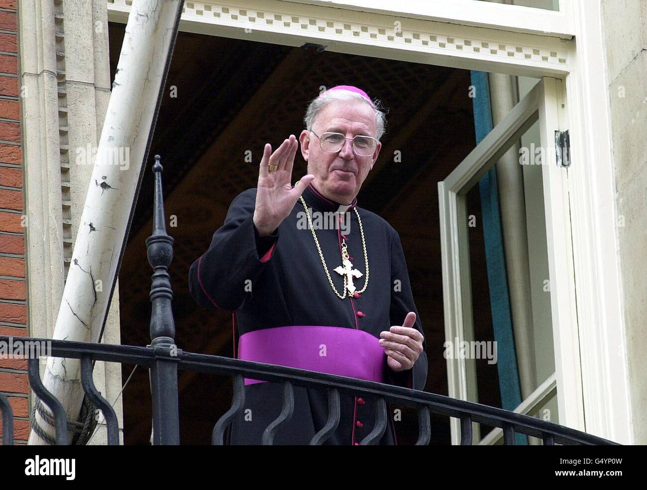 The new Archbishop of Westminster, the Most Rev Cormac Murphy-O'Connor, waves to well-wishers outside Westminster Cathedral in London, after his Installation Mass as head of the Roman Catholic church in England and Wales. * 14/9/2000: The Archbishop was telling the court wrestling with the fate of Siamese twins that they should both be allowed to die. In a written submission to the Court of Appeal, the leader of Roman Catholics in England and Wales was saying the pair should not be separated if that will lead to the death of one of the sisters. Doctors have told the court that they can save Stock Photo