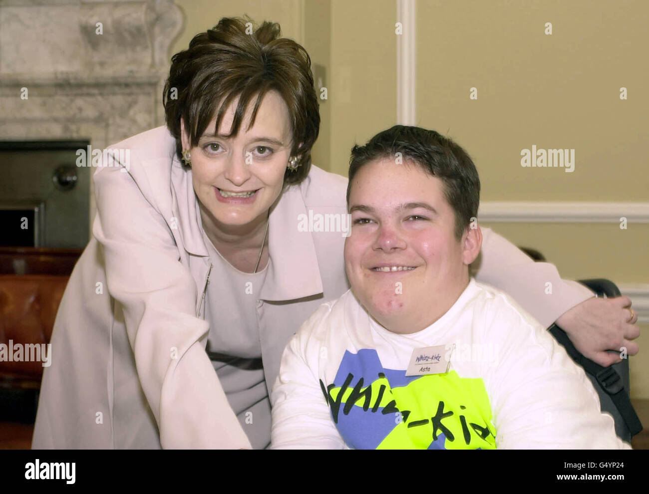 Prime Minister's wife Cherie Blair with Asta Philpot at 10 Downing Street in London, at a reception to mark the 10th birthday of the charity for disabled children, Whizz-Kidz. * Cherie joined the Whizz-Kidz Children's Board in the Cabinet Room to discuss a number of mobility related issues. Stock Photo