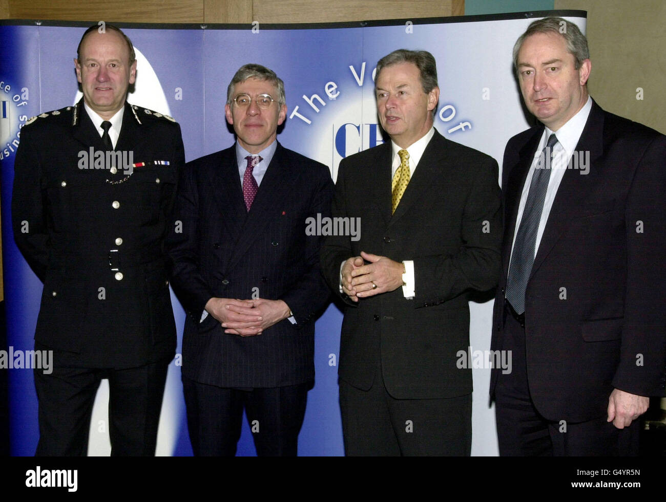 (L-R) Sir John Stevens, Commissioner of the Metropolitan Police, Home Secretary Jack Straw, Sir Clive Thompson, CBI President, and James Perry, Head of the Fraud Squad, in London, where private investigators are to be drafted in help target company fraud. * in a government-backed scheme to speed up police investigations, the Confederation of British Industry said today. The CBI, Metropolitan and City police initiative was being announced at a press conference with Straw. Stock Photo