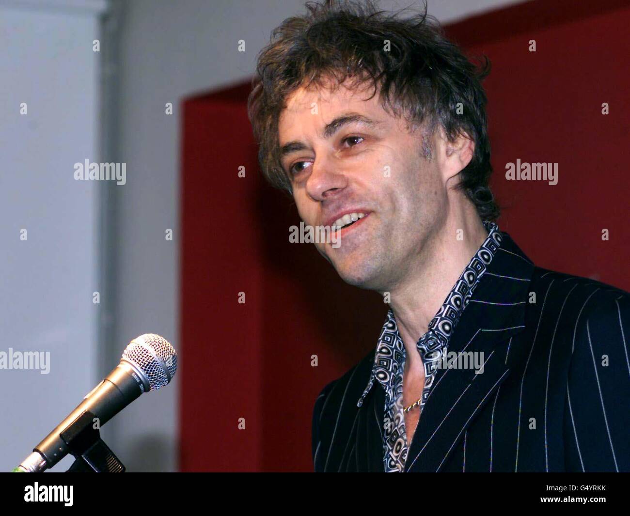 Pop star and radio DJ Bob Geldof speaking during a Jubilee 2000 Reception in London, as wealthy countries in the world have promised to write off 100 billion US dollars of the debt of the poorest countries, in response to the Jubilee 2000 debt campaign. Stock Photo
