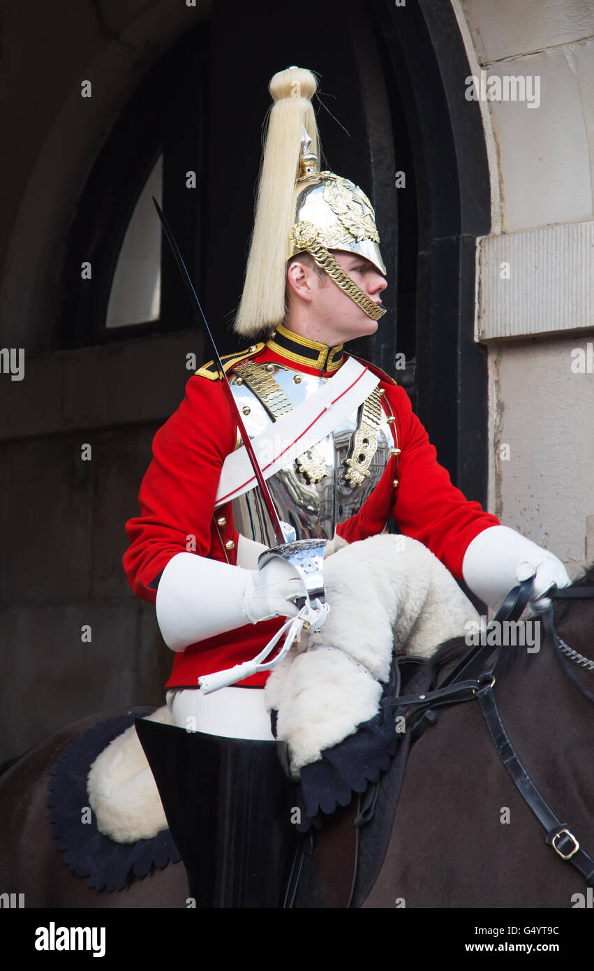 LONDON - APRIL 16: Unidentified men members of the royal guard nearby Whitehall palace on April 16, 2016 in London, United Kingd Stock Photo