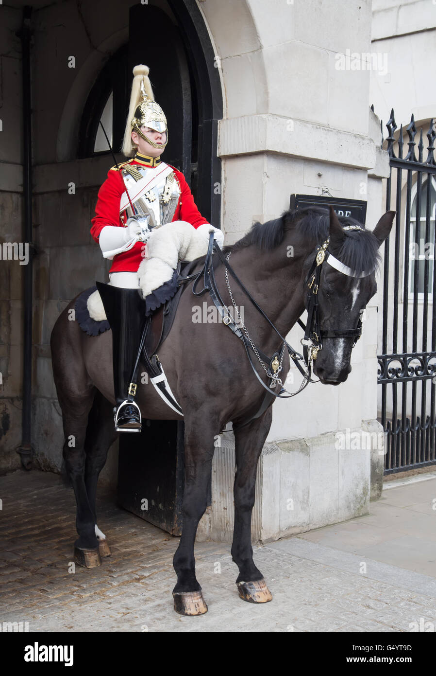 LONDON - APRIL 16: Unidentified men members of the royal guard nearby Whitehall palace on April 16, 2016 in London, United Kingd Stock Photo