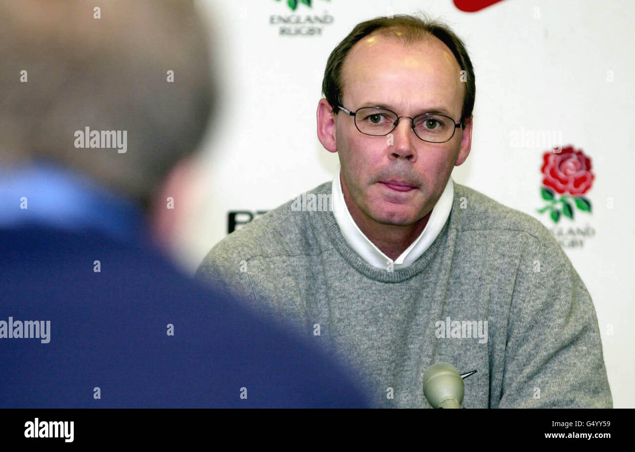 England rugby coach Clive Woodward answers questions from journalists during a press conference at the Marriott Dalmahoy hotel, near Edinburgh, in advance of their Six Nations Rugby Championship match against Scotland. Stock Photo