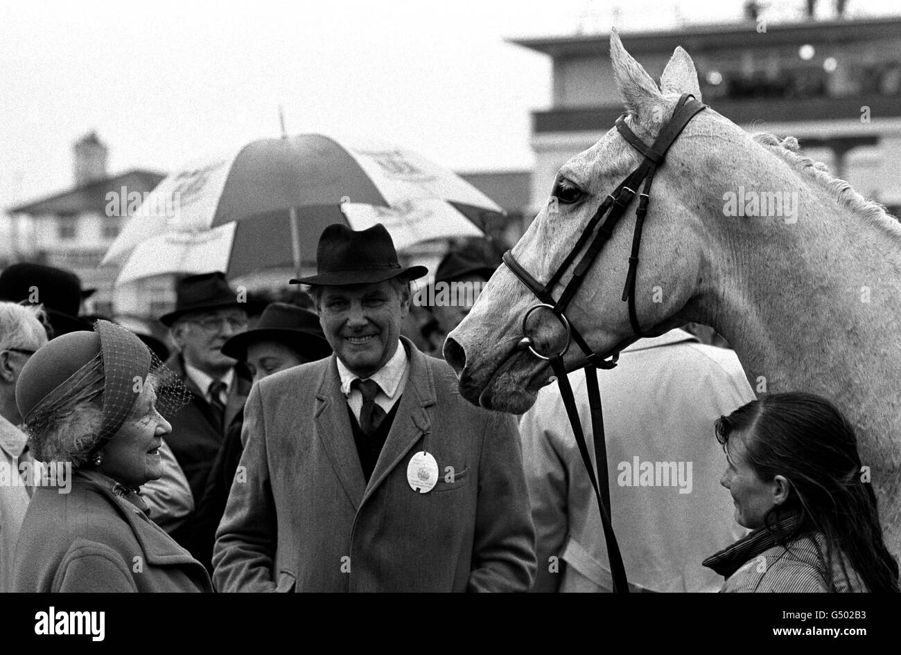 The Queen Mother (L) with James Burridge, owner of Desert Orchid, Britain's most popular racehorse who crowned his illustrious career by winning the Tote Gold Cup at Cheltenham. Stock Photo